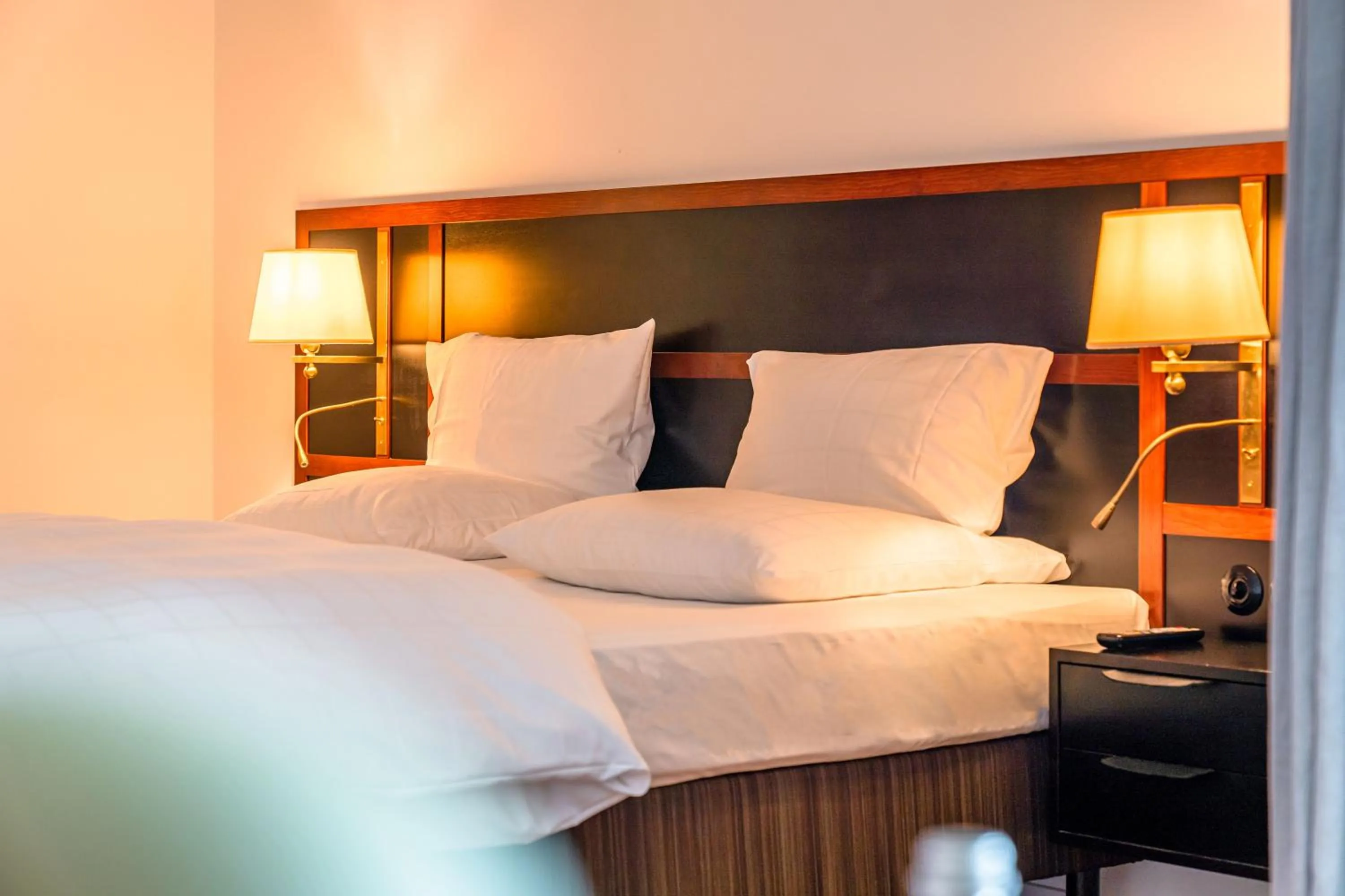 Photo of the whole room, Bed in Hotel Erbprinz - Gourmet & Spa