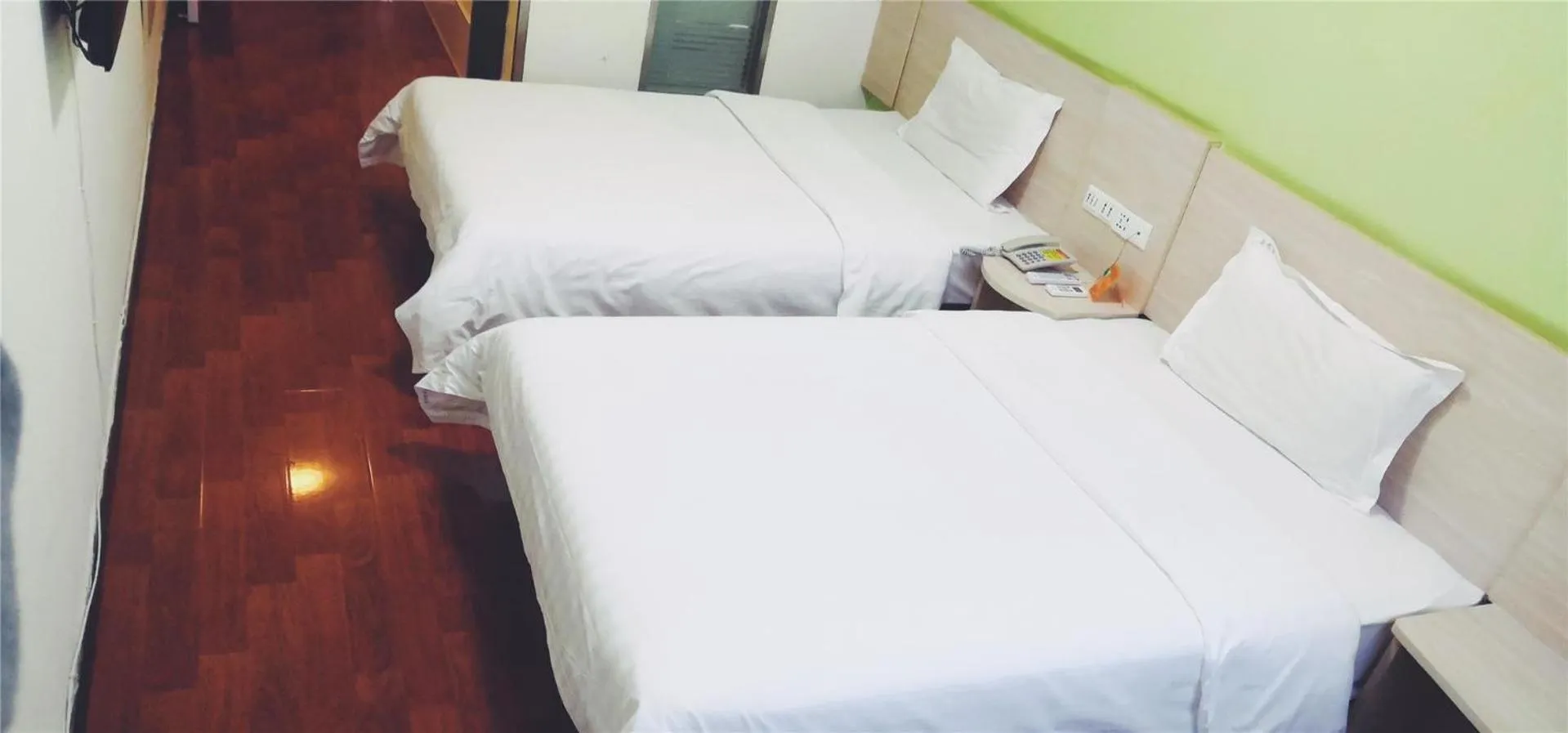Bed in 7Days Inn Tangshan Silicon Valley Digital City