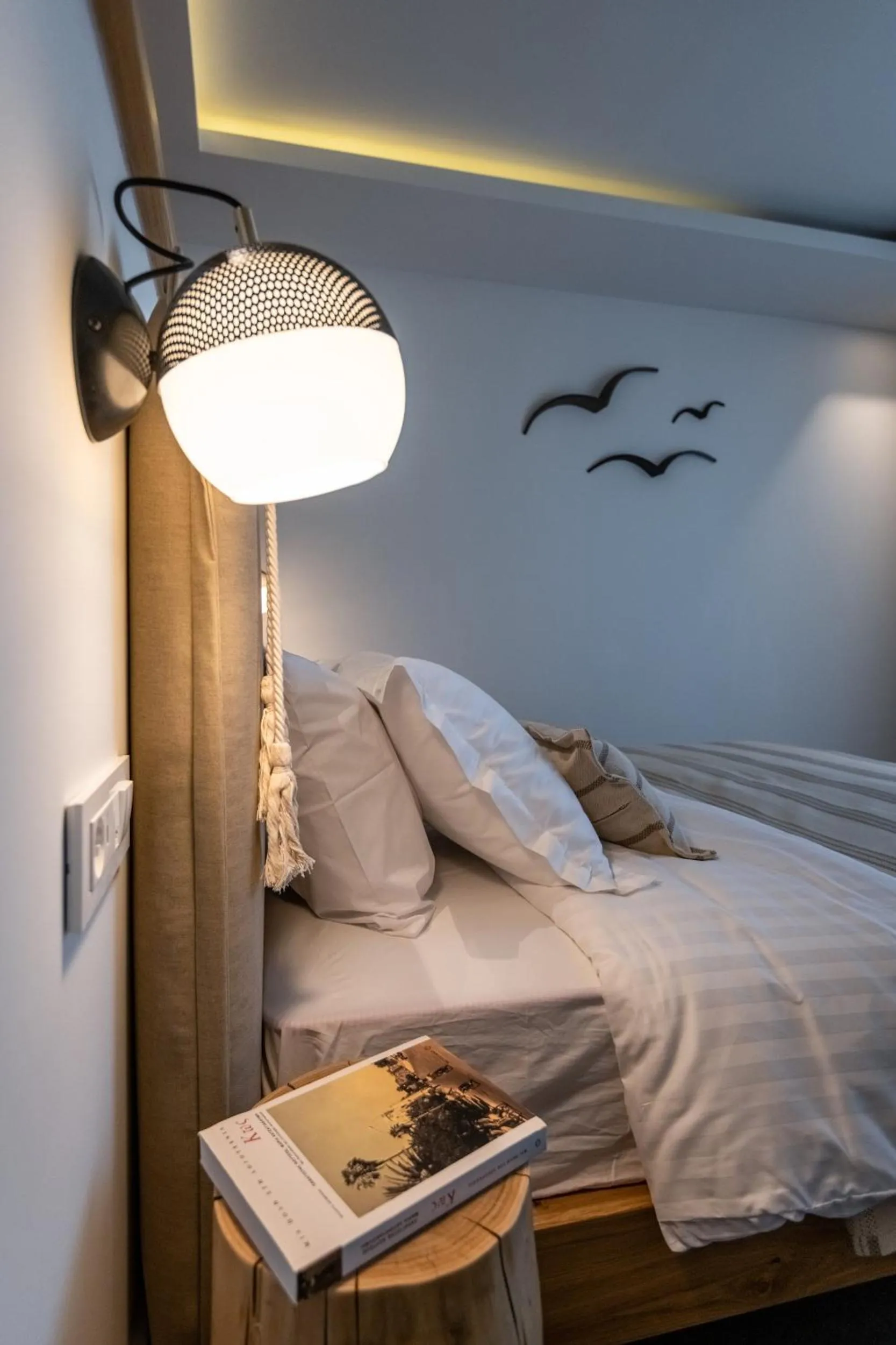 Bed in NISSEA Boutique Hotel