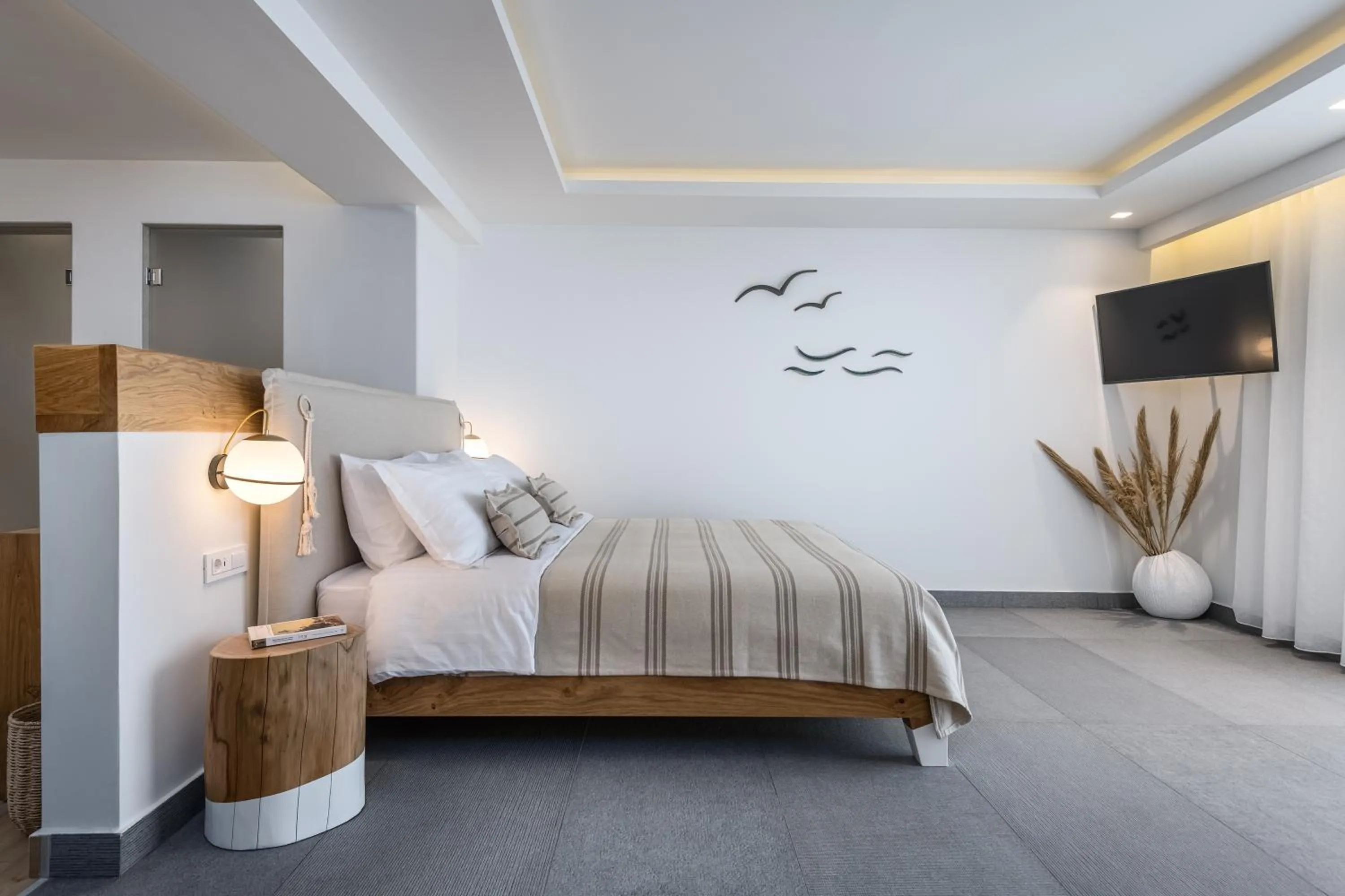 Bed in NISSEA Boutique Hotel