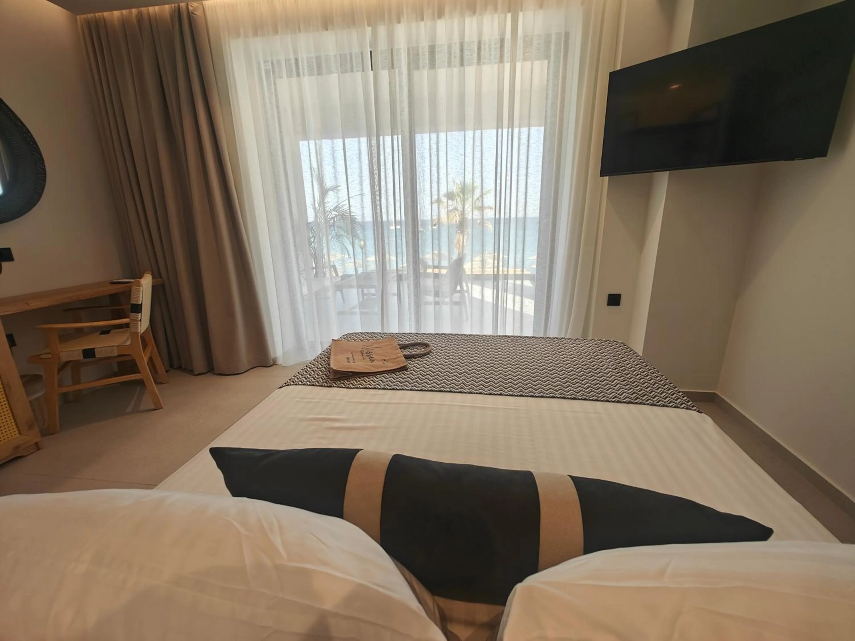 Bed in NISSEA Boutique Hotel