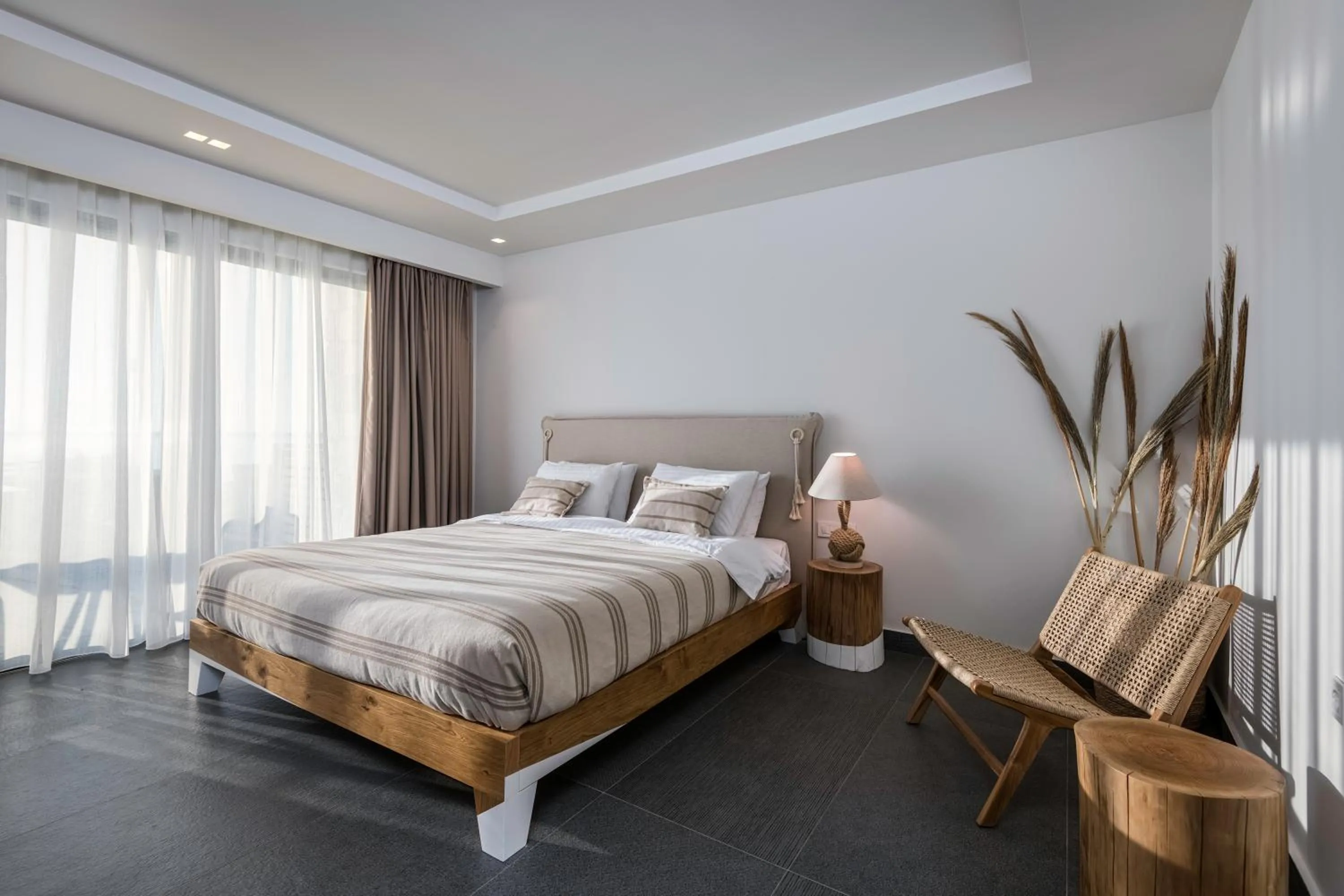 Bed in NISSEA Boutique Hotel