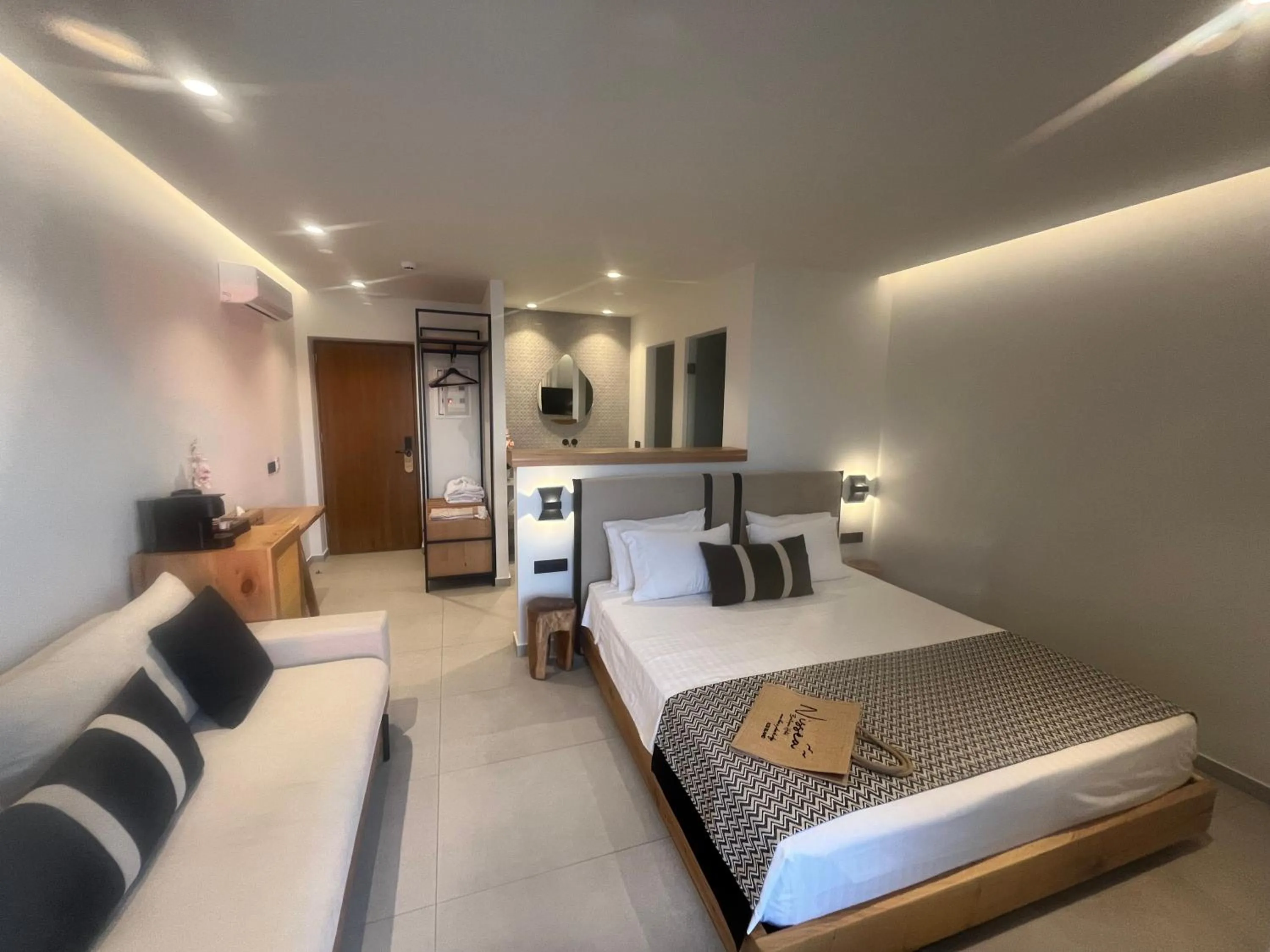 Bed in NISSEA Boutique Hotel