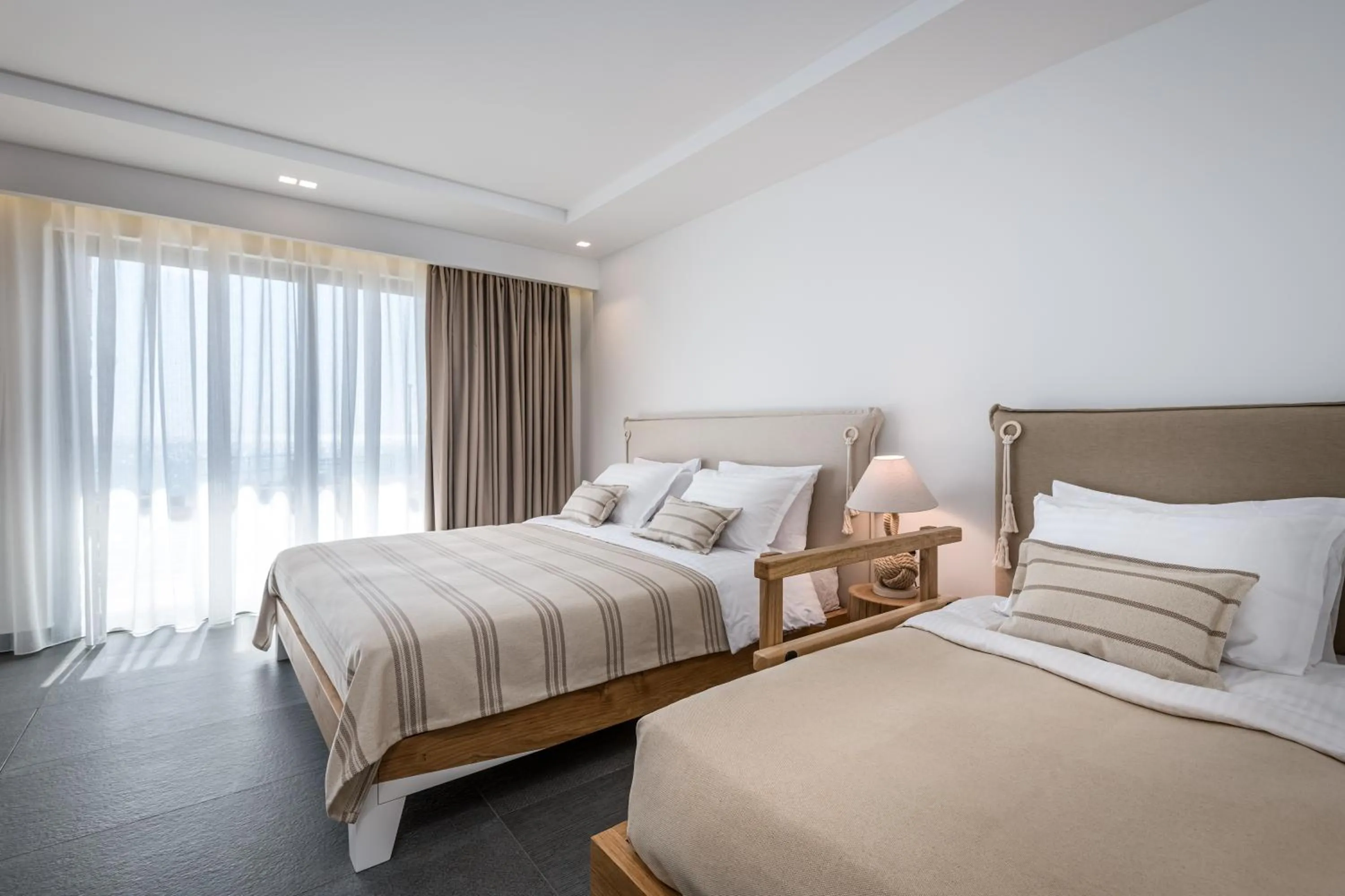 Bed in NISSEA Boutique Hotel