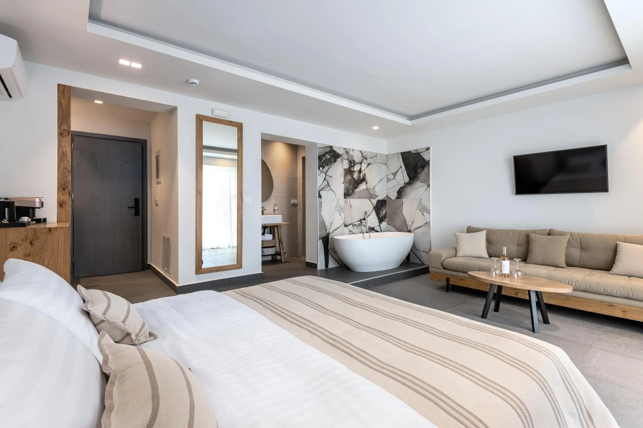 Bed in NISSEA Boutique Hotel