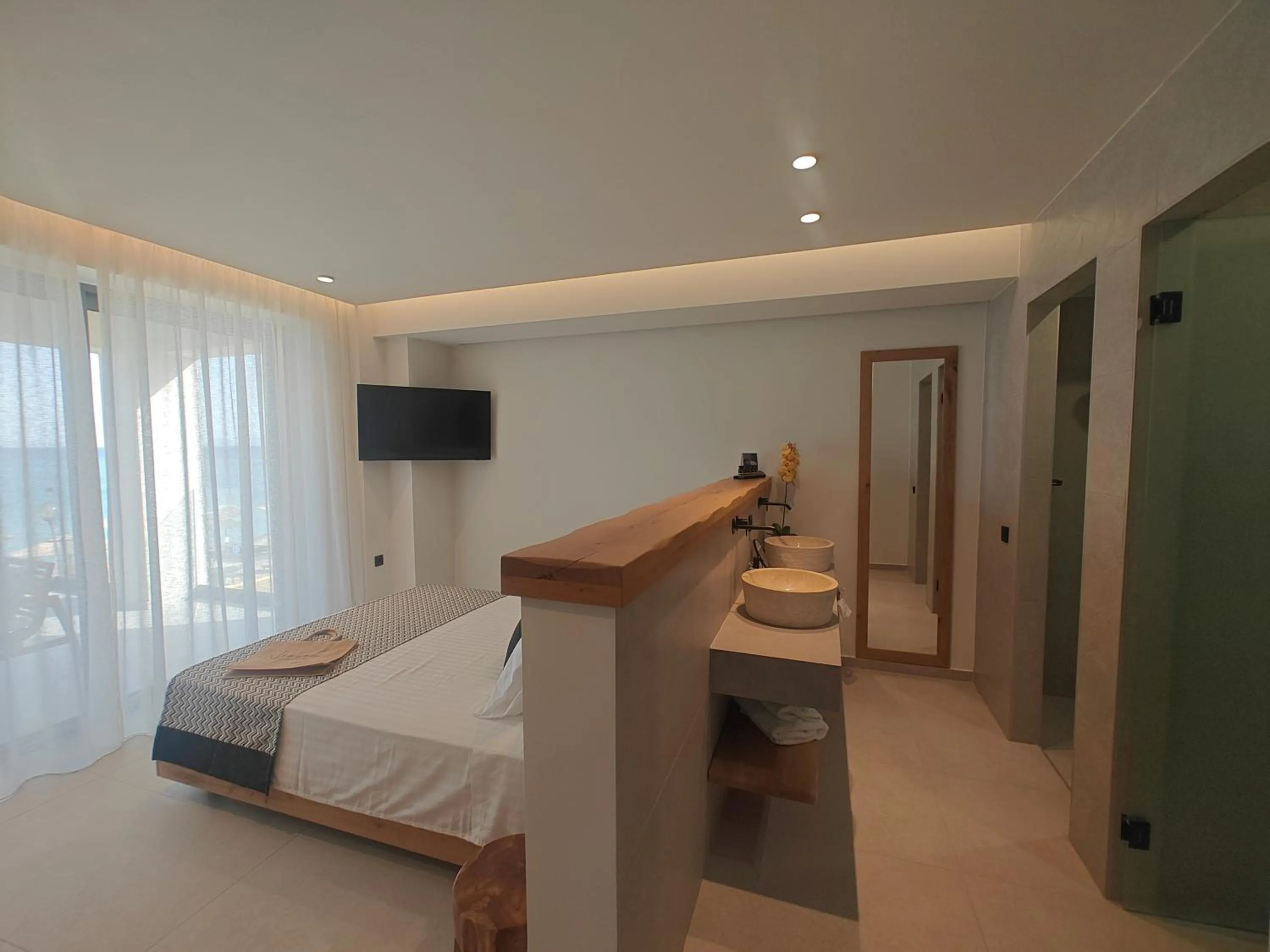 Bed in NISSEA Boutique Hotel