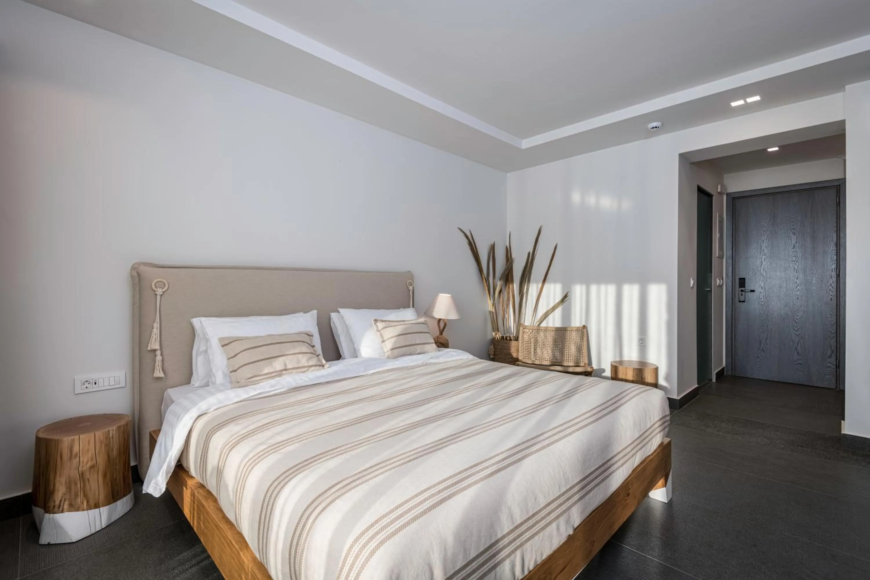Bed in NISSEA Boutique Hotel