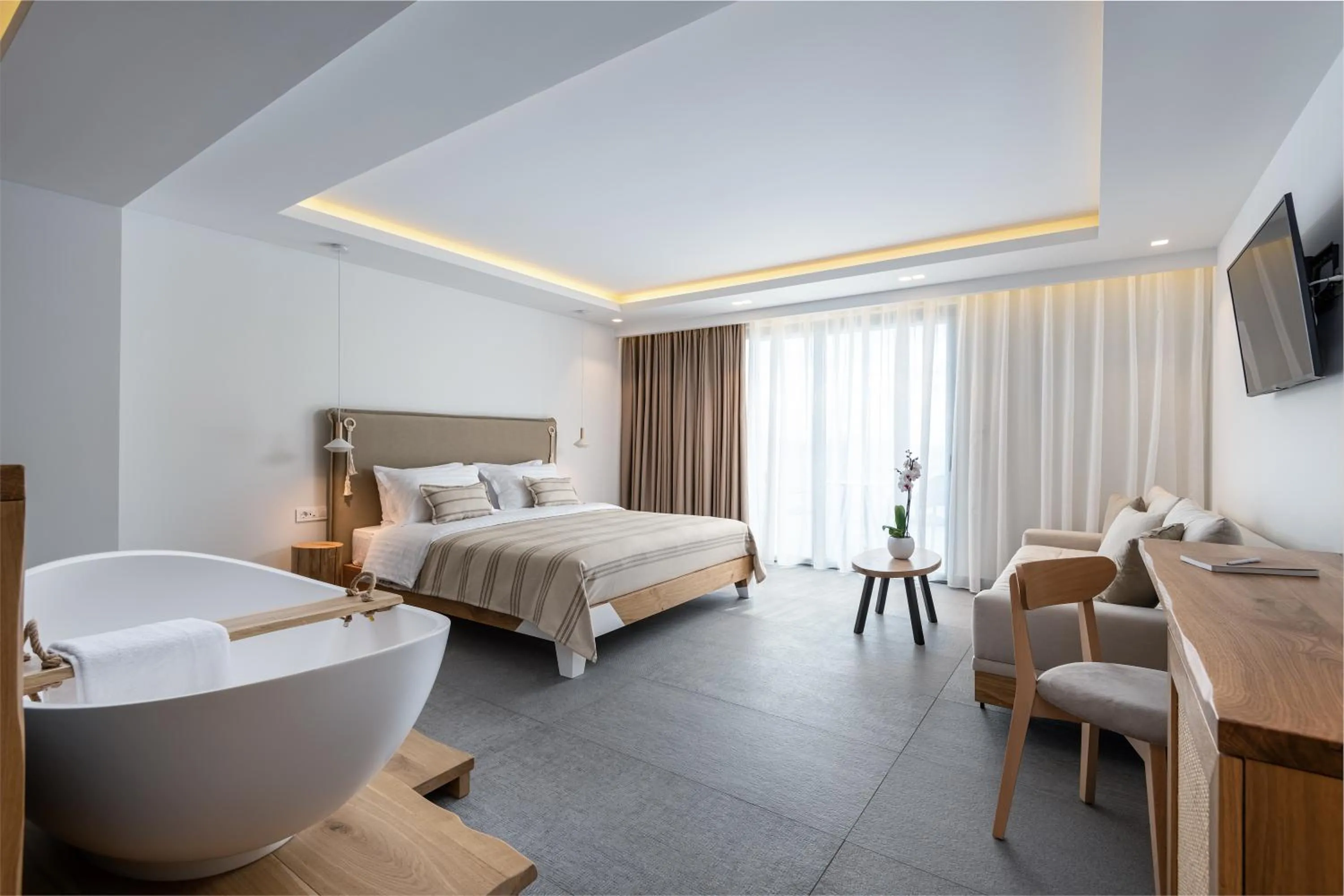 Bed in NISSEA Boutique Hotel