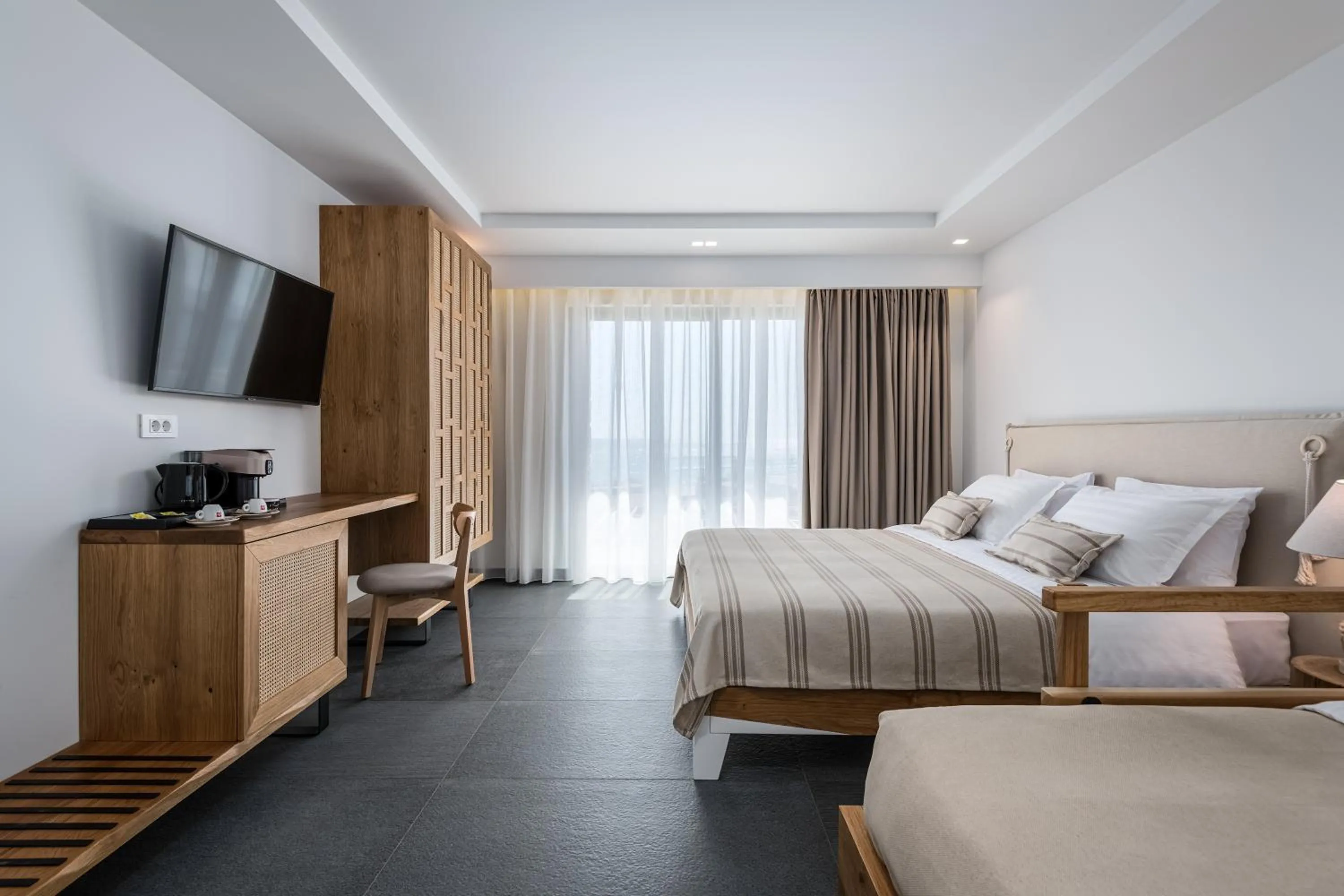 Bed in NISSEA Boutique Hotel