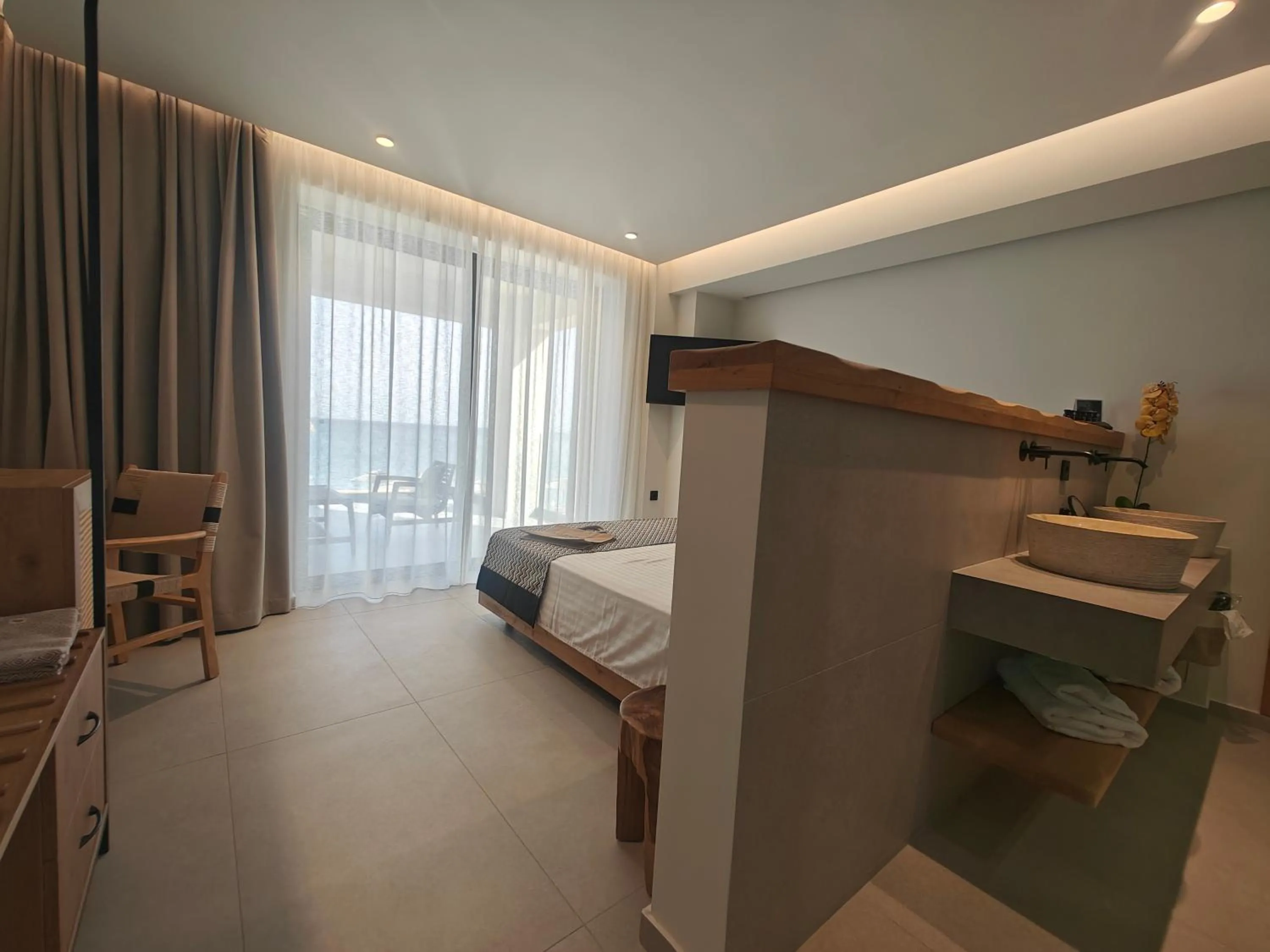 Bed in NISSEA Boutique Hotel