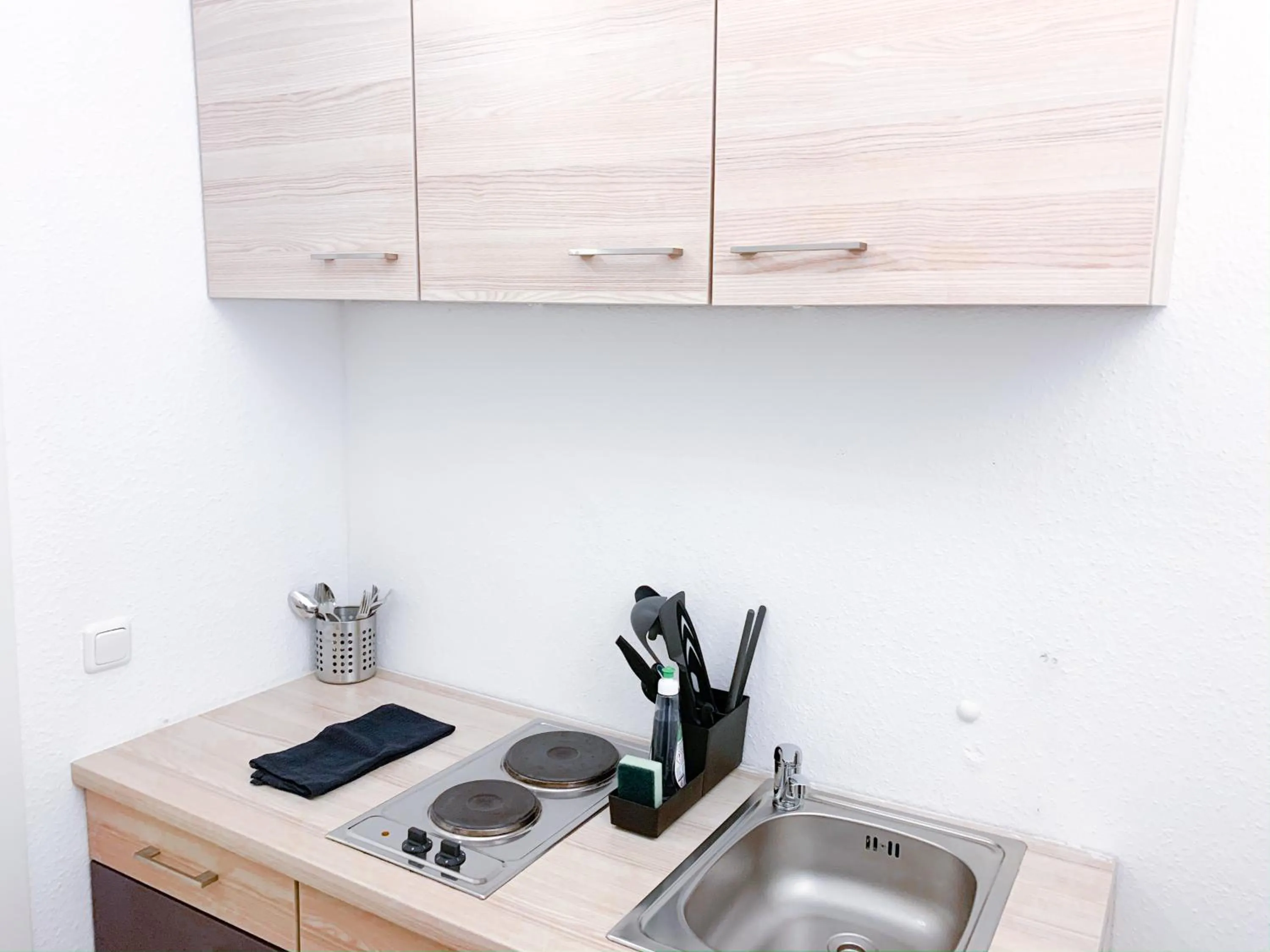 Kitchen or kitchenette in Relax Aachener Boardinghouse Appartements Premium 1