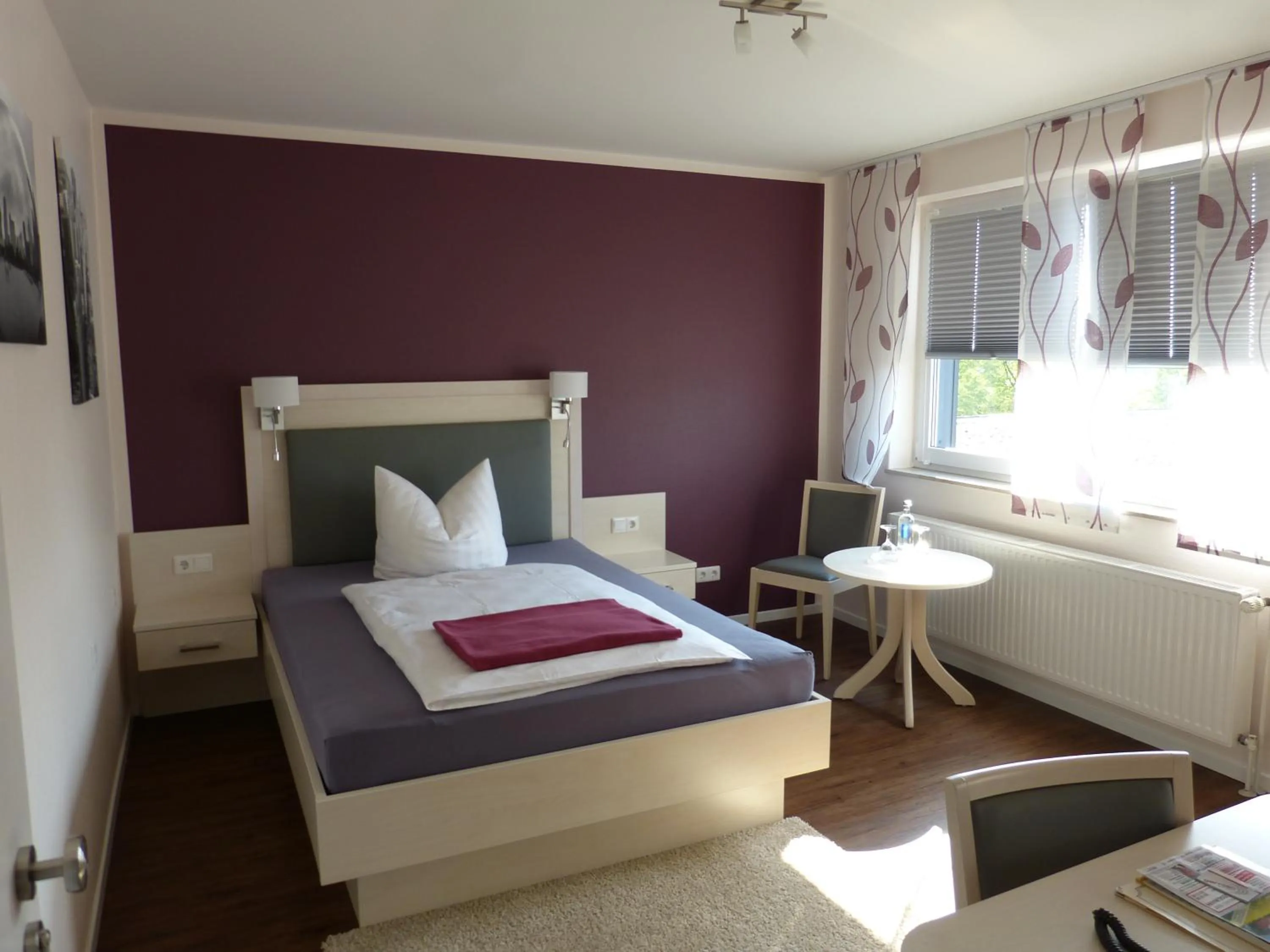 Photo of the whole room, Bed in Landgasthaus Gieseke-Asshorn