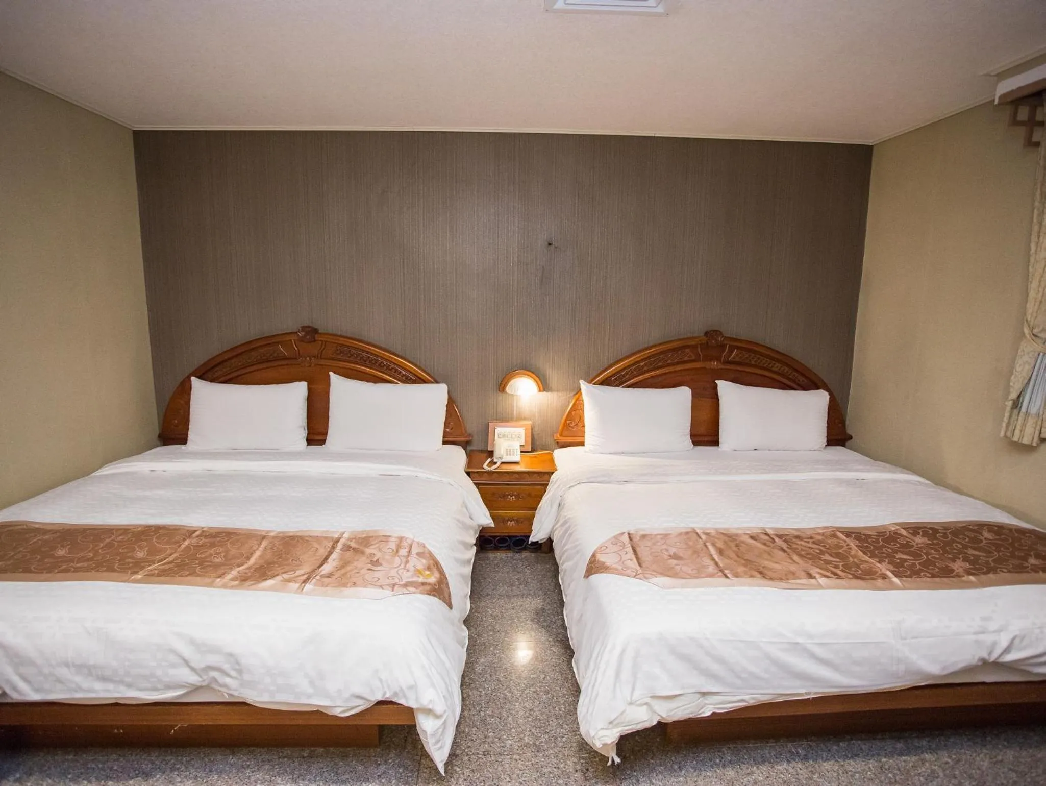 Bed in Mei Jia Mei Hotel