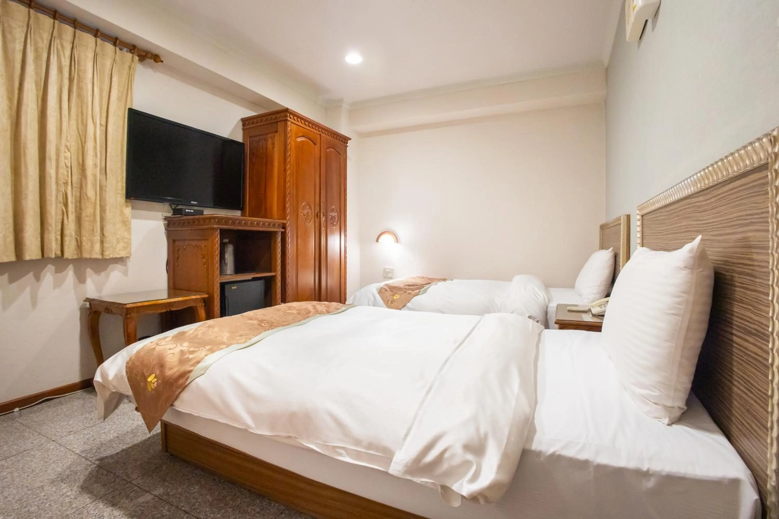 Bed in Mei Jia Mei Hotel