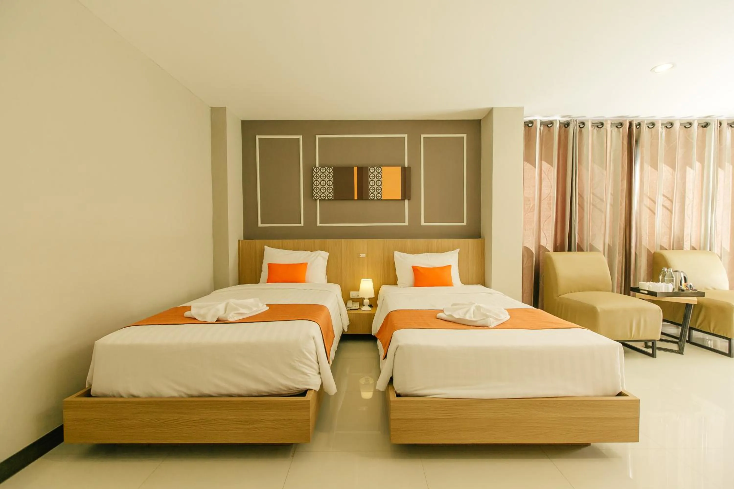 Bed in De Hug Hotel & Residence