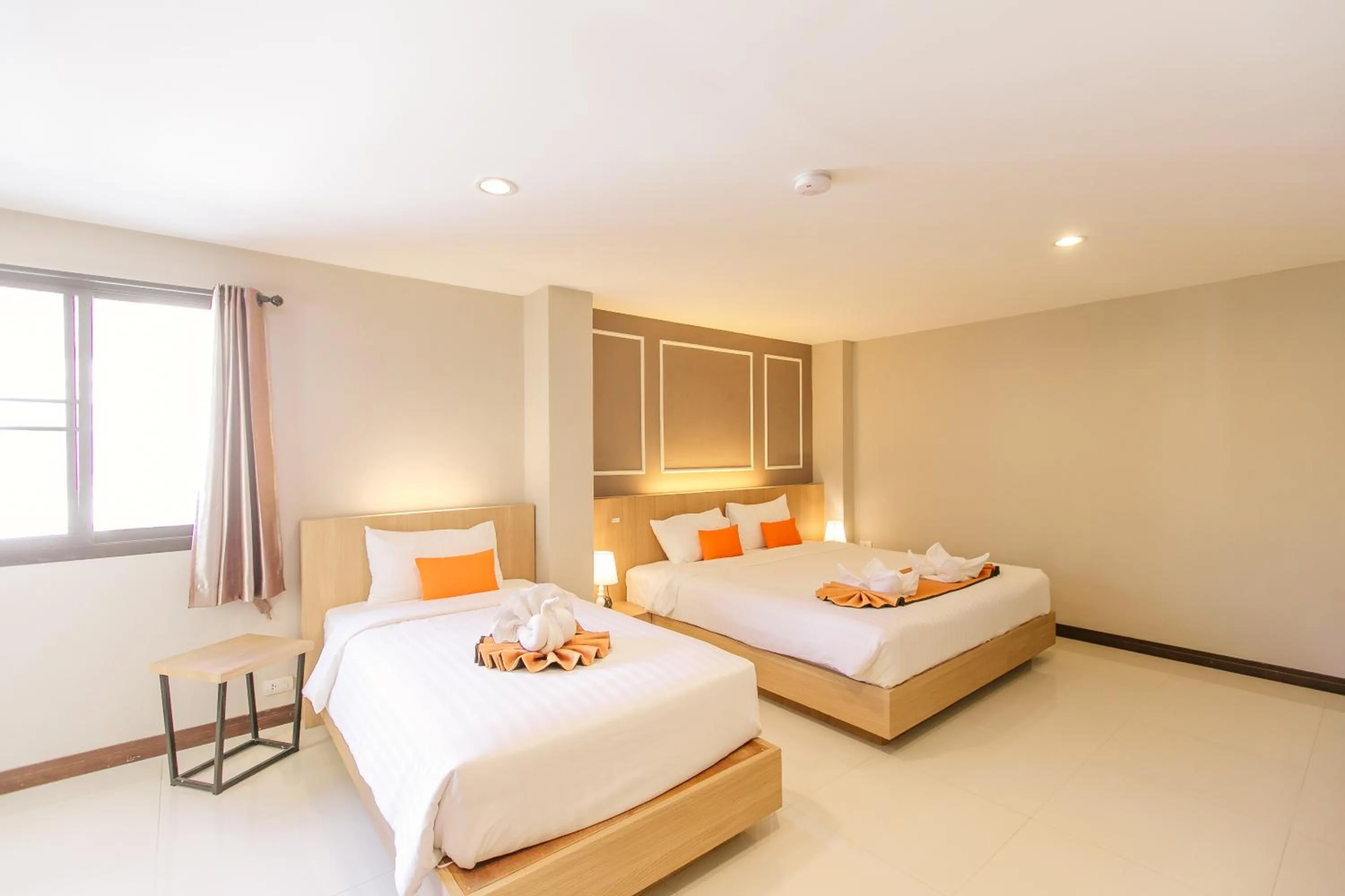 Bed in De Hug Hotel & Residence