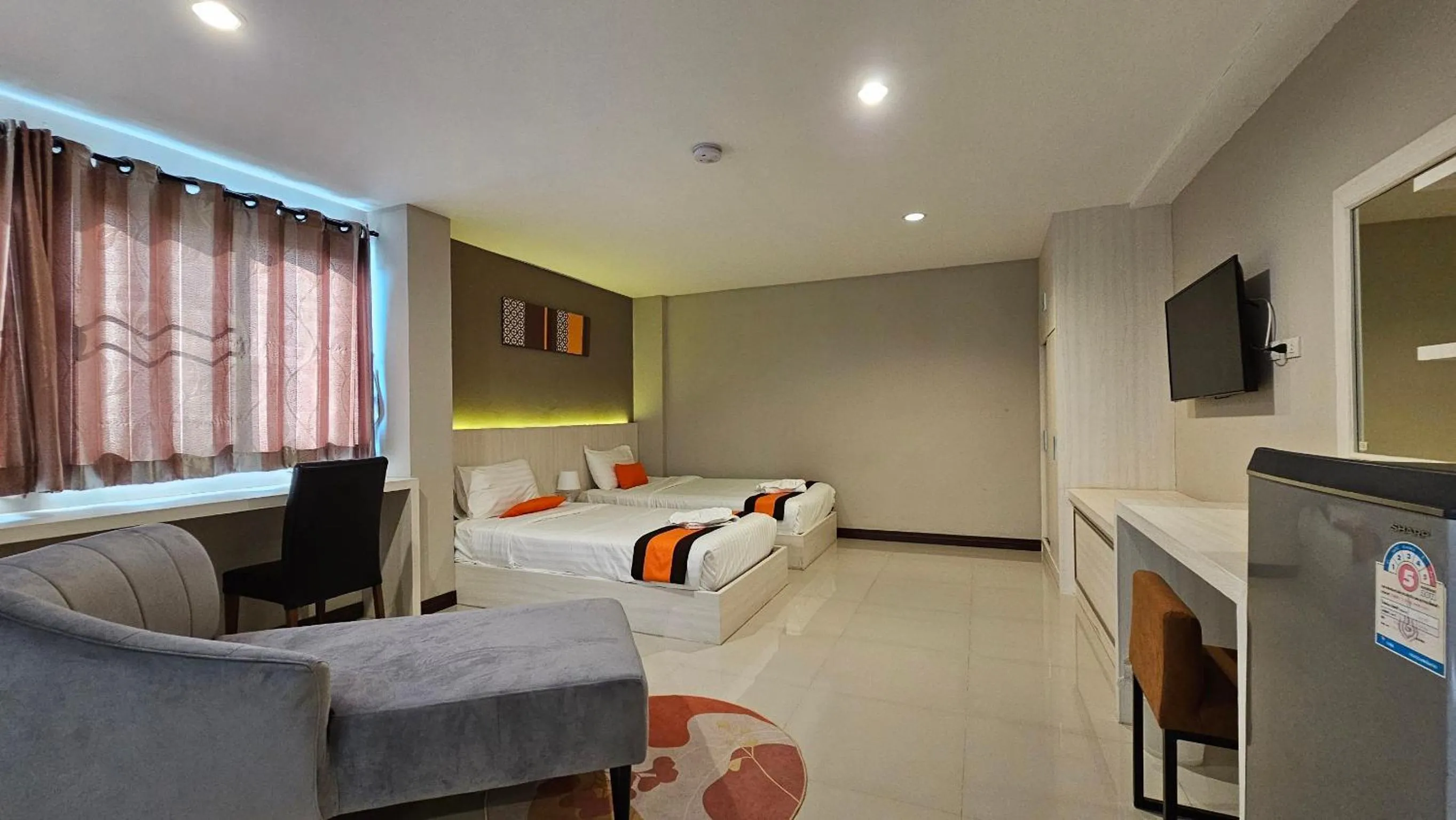 Communal lounge/ TV room, Bed in De Hug Hotel & Residence