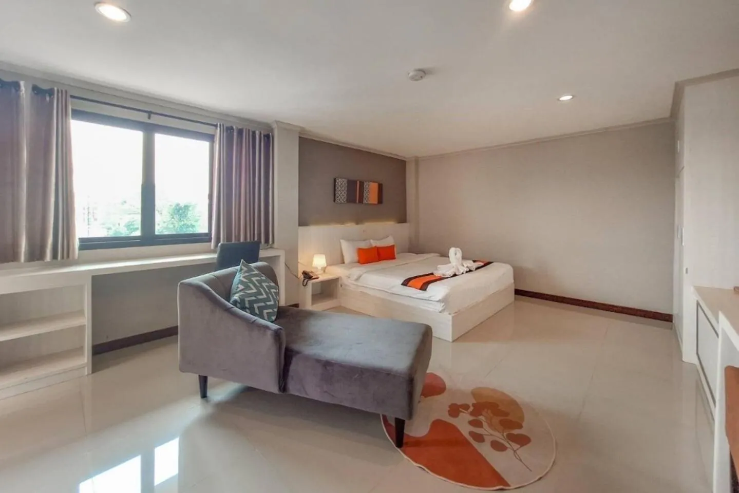 Communal lounge/ TV room, Bed in De Hug Hotel & Residence