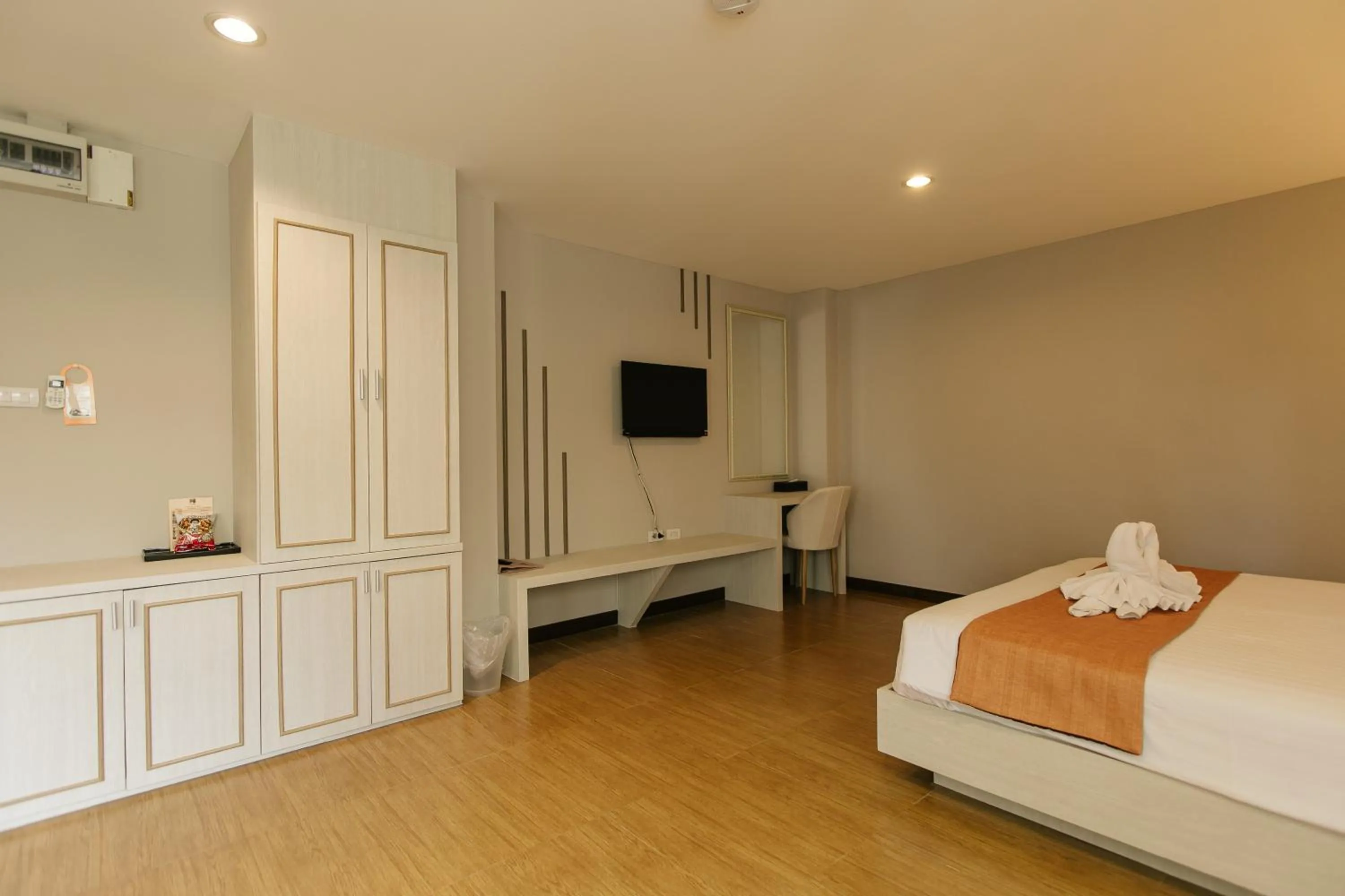 Bed in De Hug Hotel & Residence