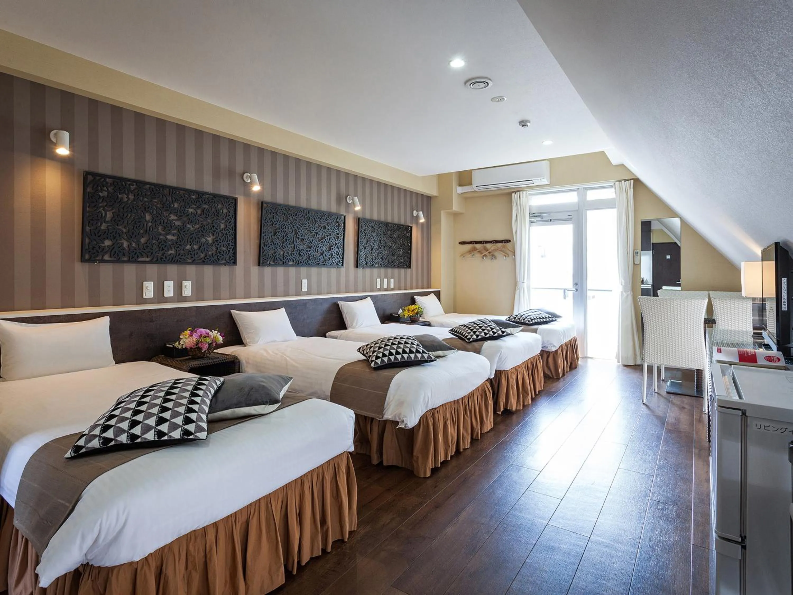 Photo of the whole room, Bed in かりゆしコンドミニアムリゾート那覇スカイリビングホテル旭橋駅前