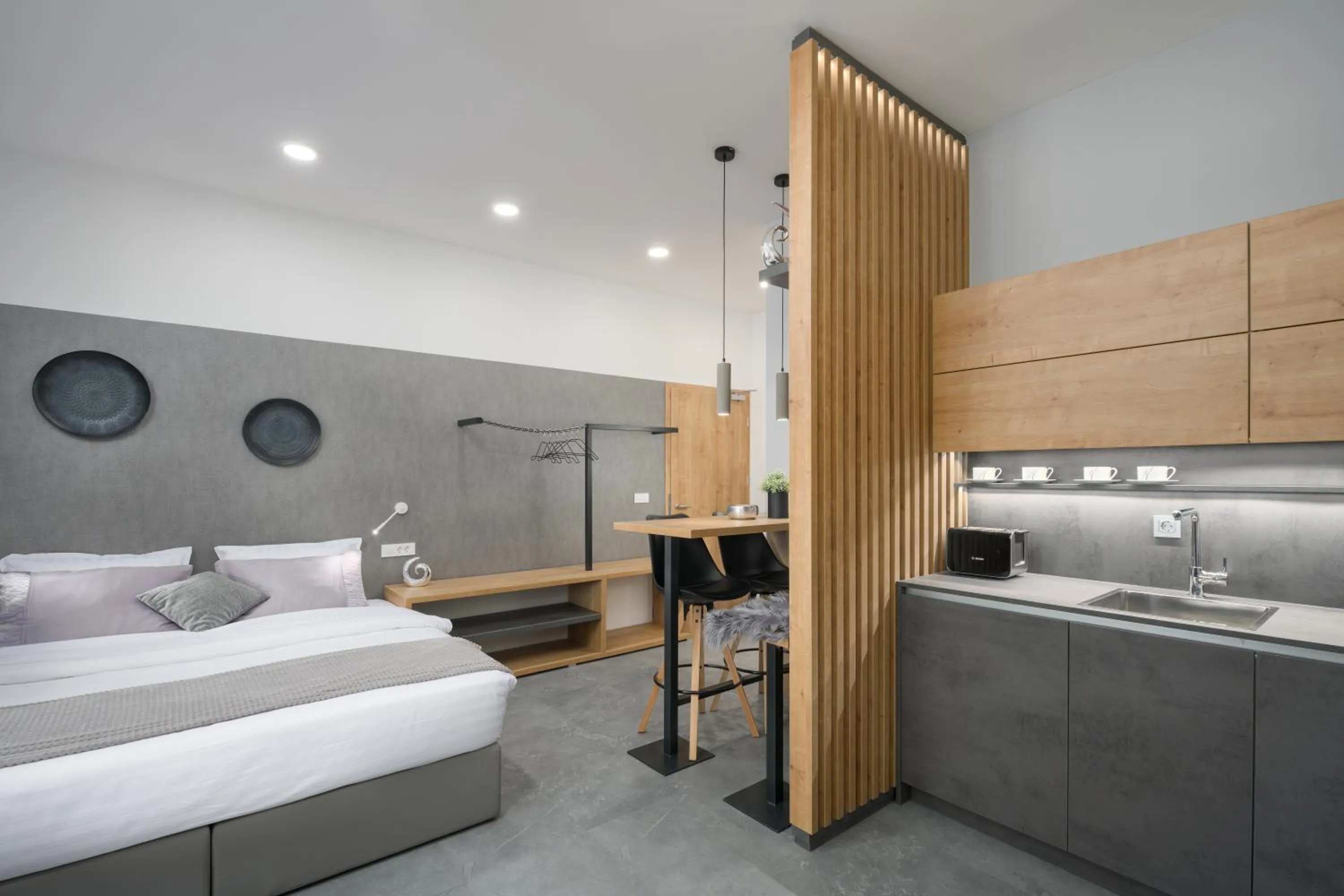 Kitchen or kitchenette, Bed in Vila Emona - Central Apartments - Free Parking