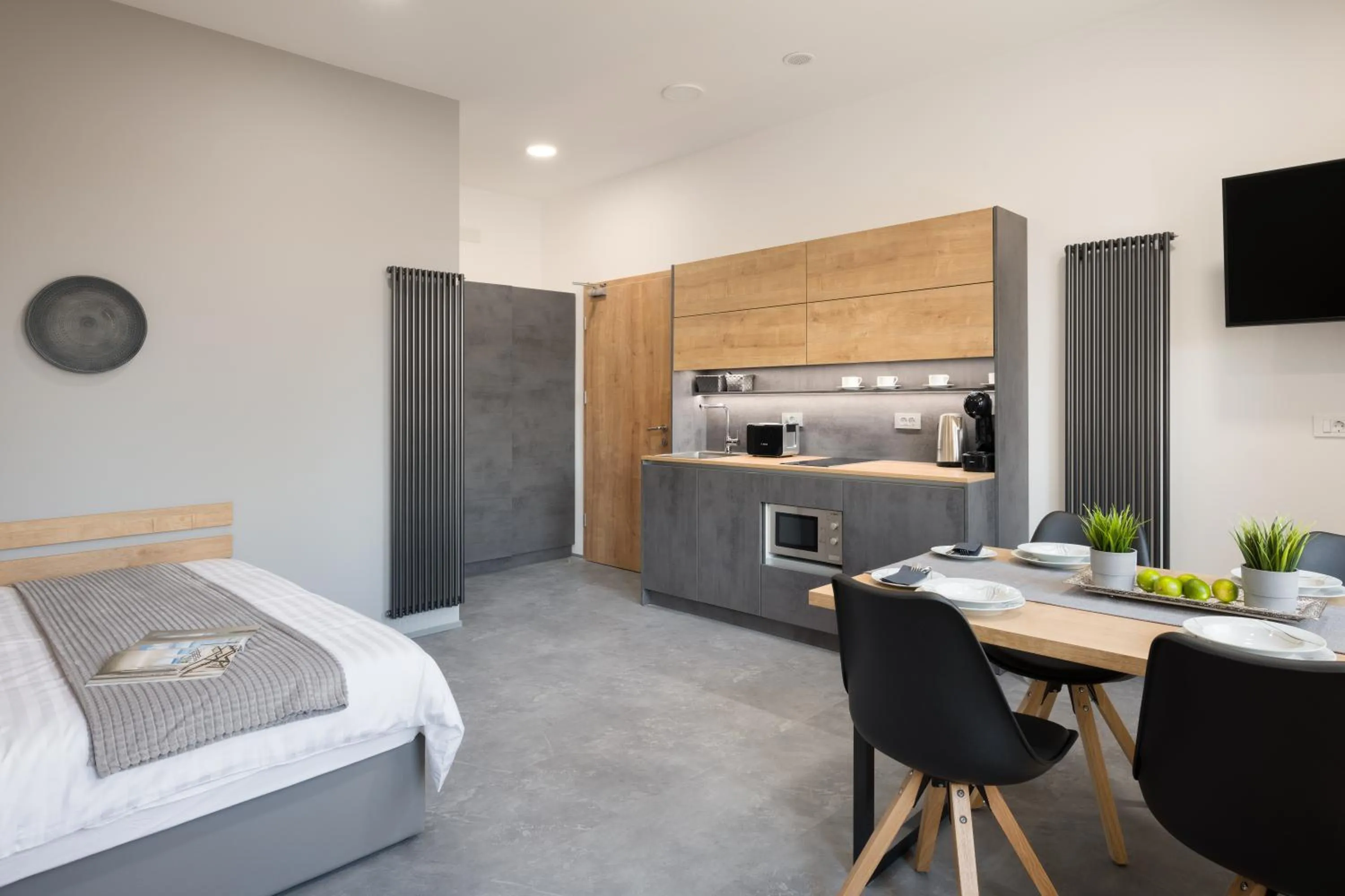 Kitchen or kitchenette, Bed in Vila Emona - Central Apartments - Free Parking