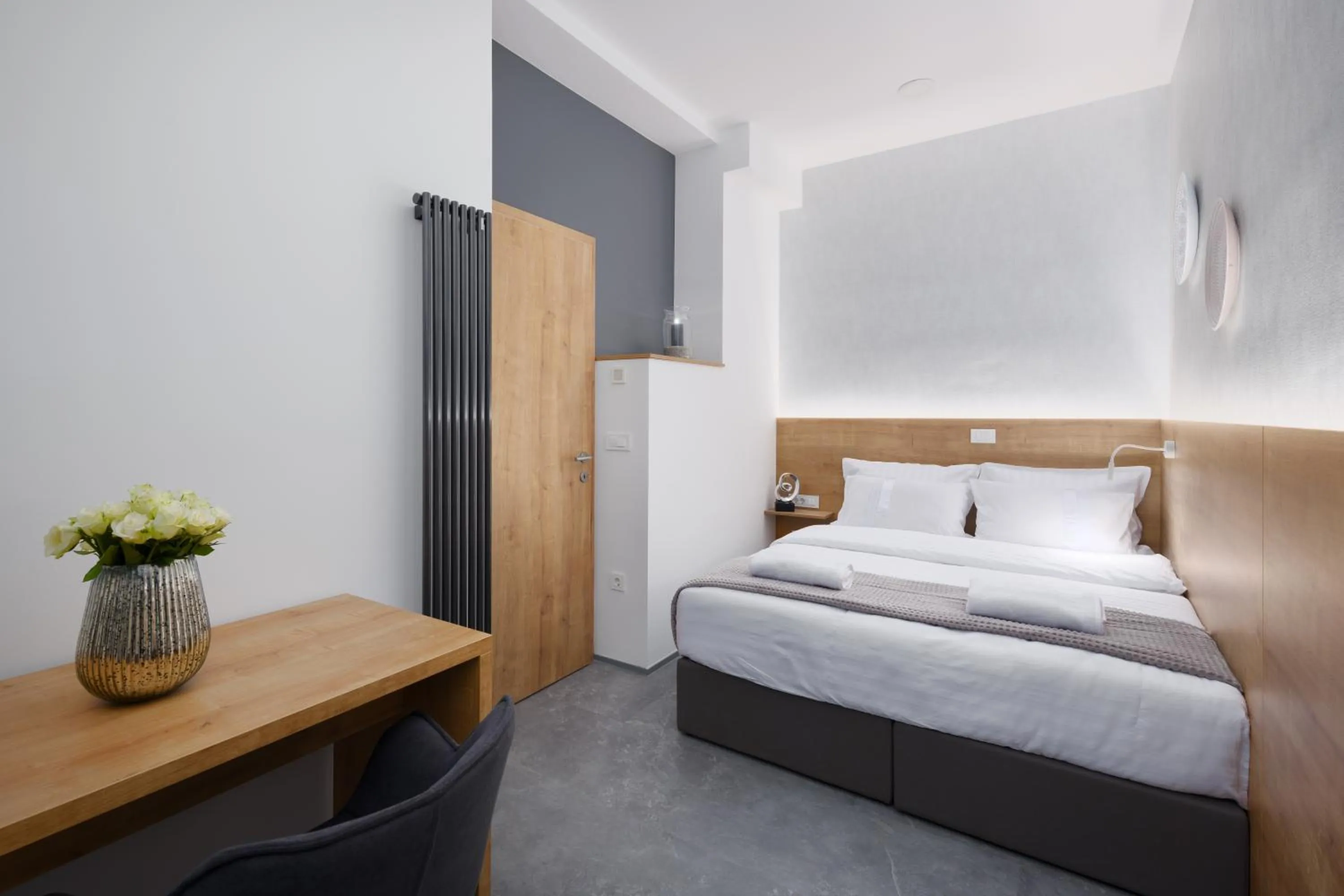 Bedroom, Bed in Vila Emona - Central Apartments - Free Parking