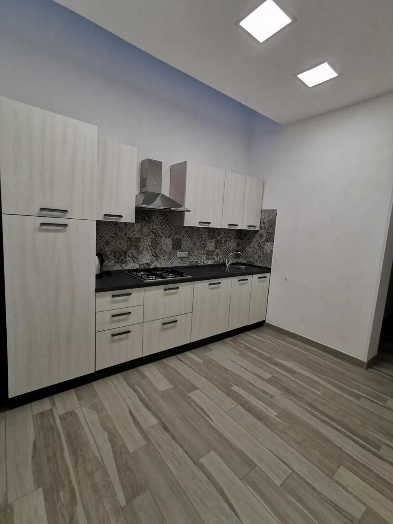 Communal kitchen in B&B La Casa di Pino