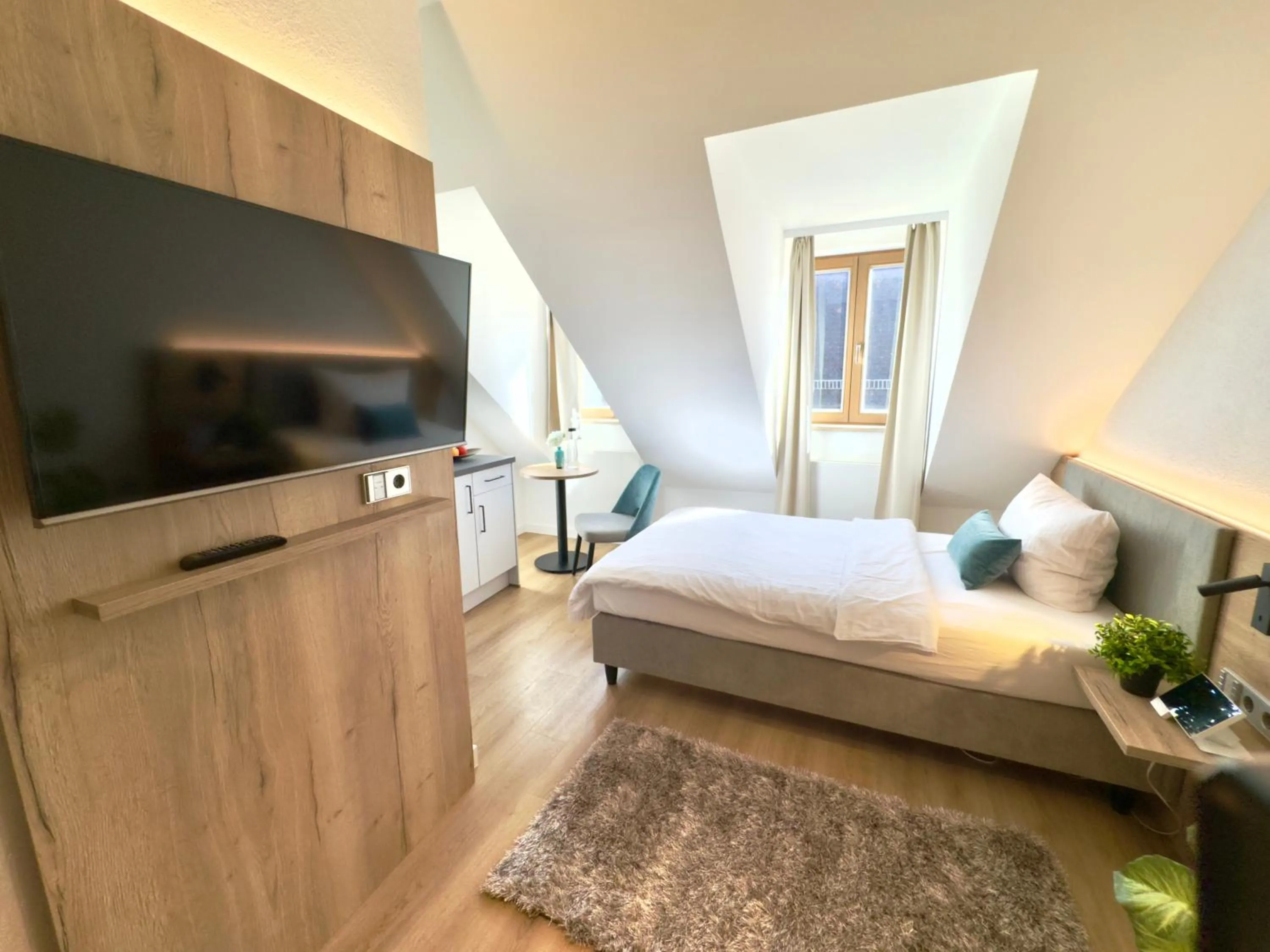 Bed in Living & Serviced Apartments by Blauer Wolf