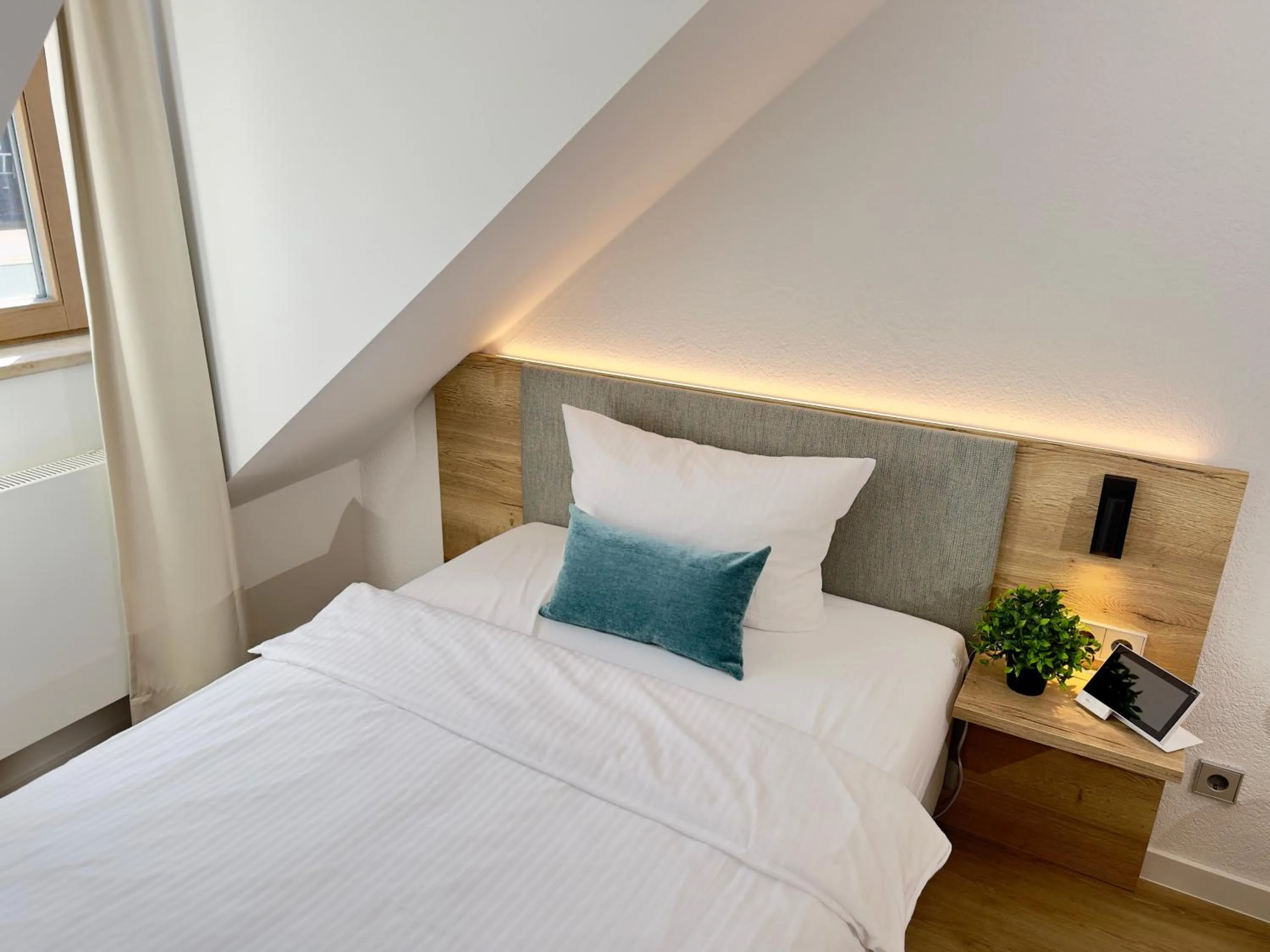 Bed in Living & Serviced Apartments by Blauer Wolf