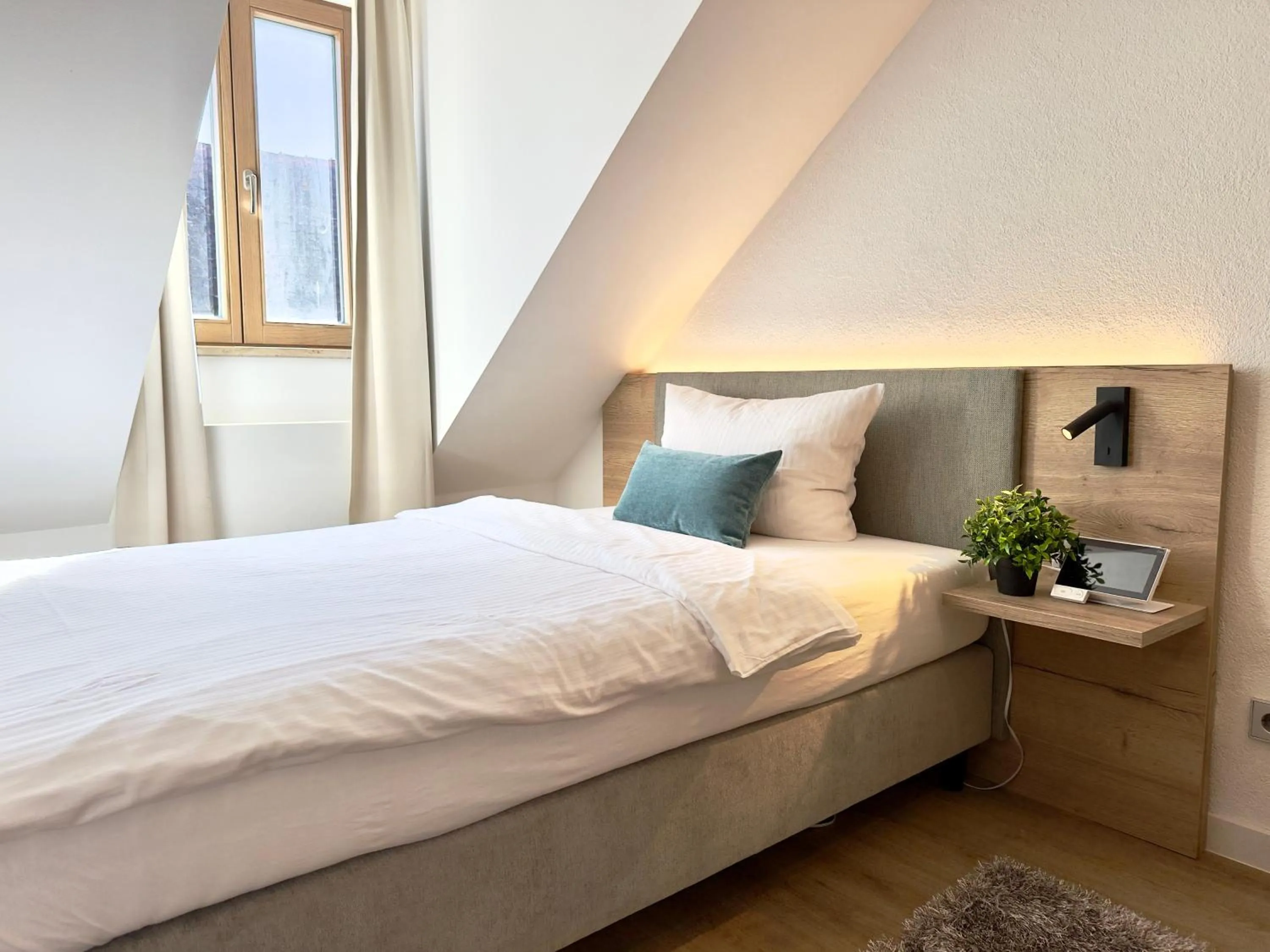 Bed in Living & Serviced Apartments by Blauer Wolf