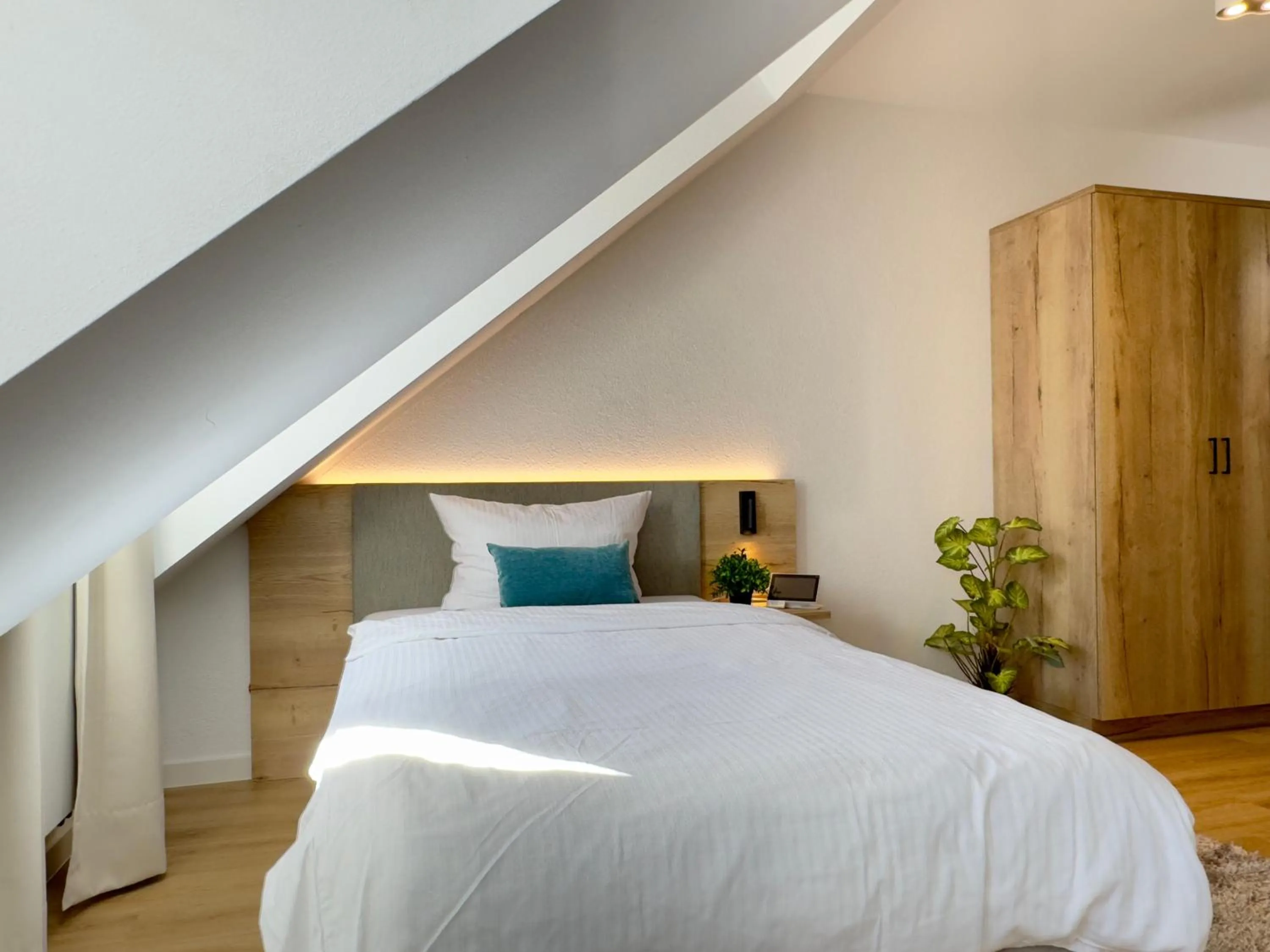 Bed in Living & Serviced Apartments by Blauer Wolf