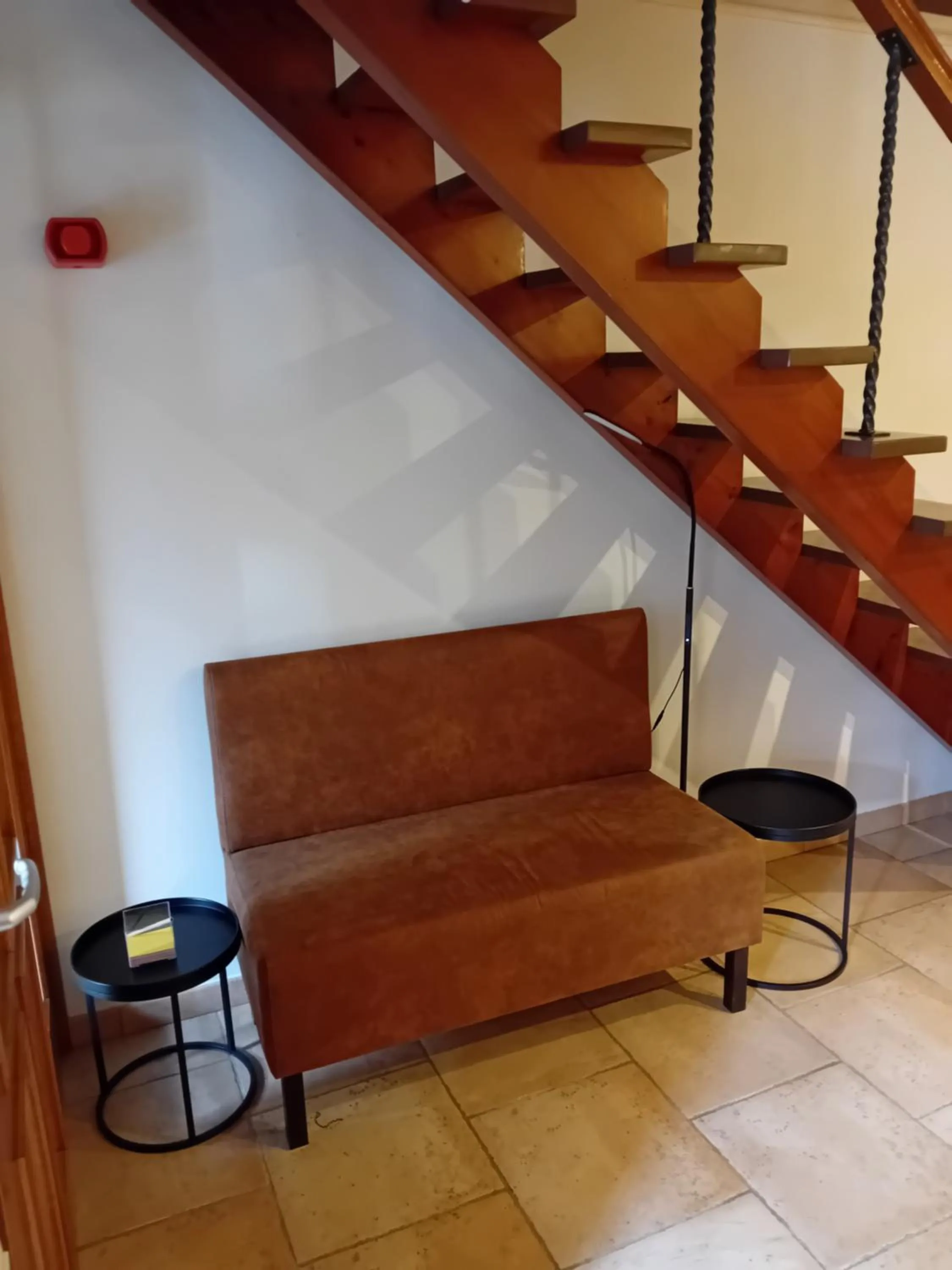 Seating area in Appart Hotel Au Pied de Vigne