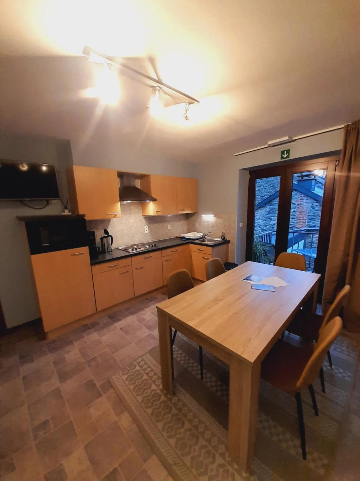 Kitchen or kitchenette in Appart Hotel Au Pied de Vigne