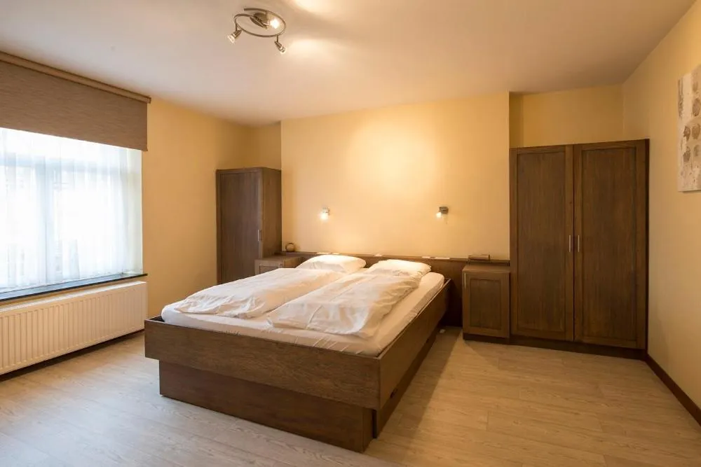 Bed in Appart Hotel Au Pied de Vigne