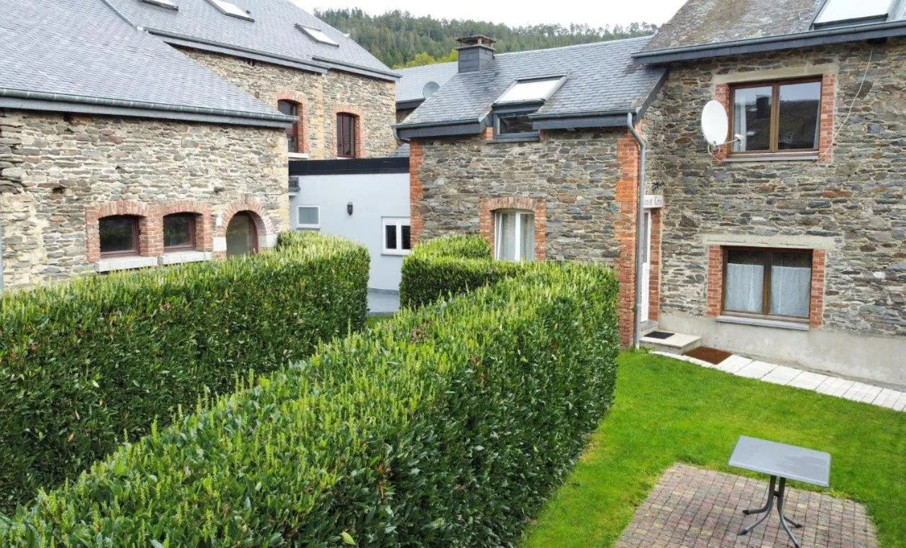 Property building in Appart Hotel Au Pied de Vigne
