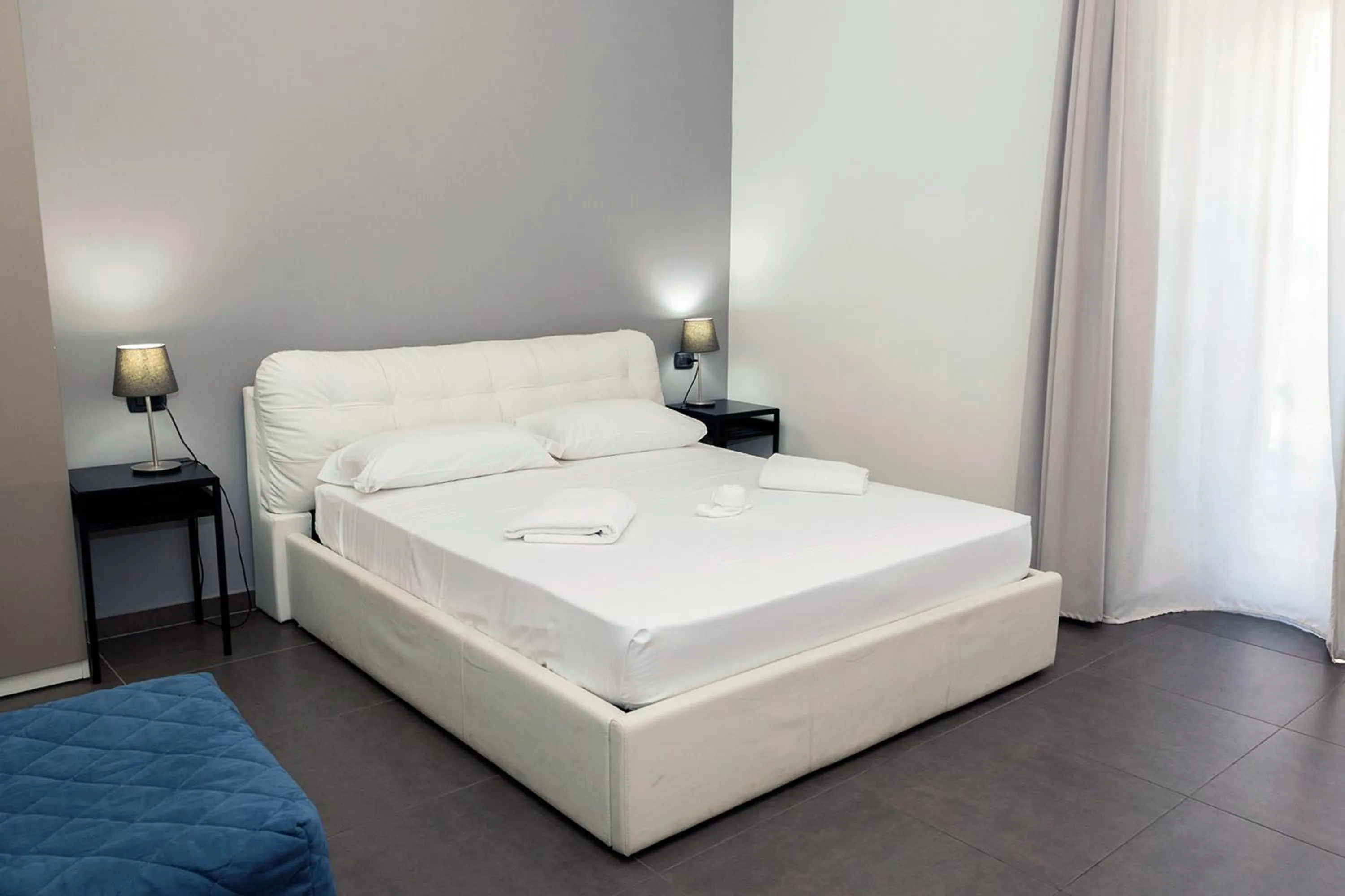 Bed in Doria Suites Napoli