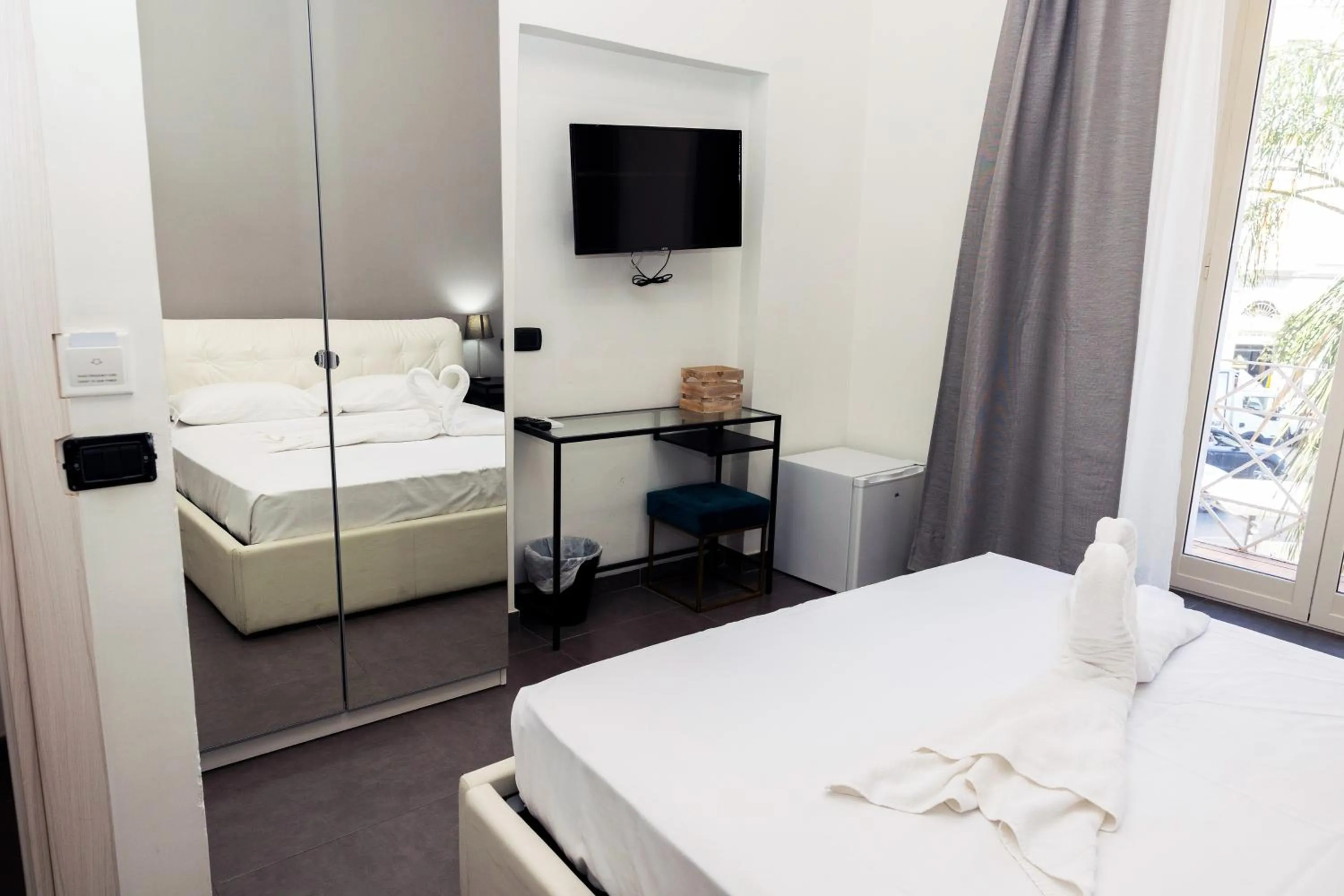 Bed in Doria Suites Napoli