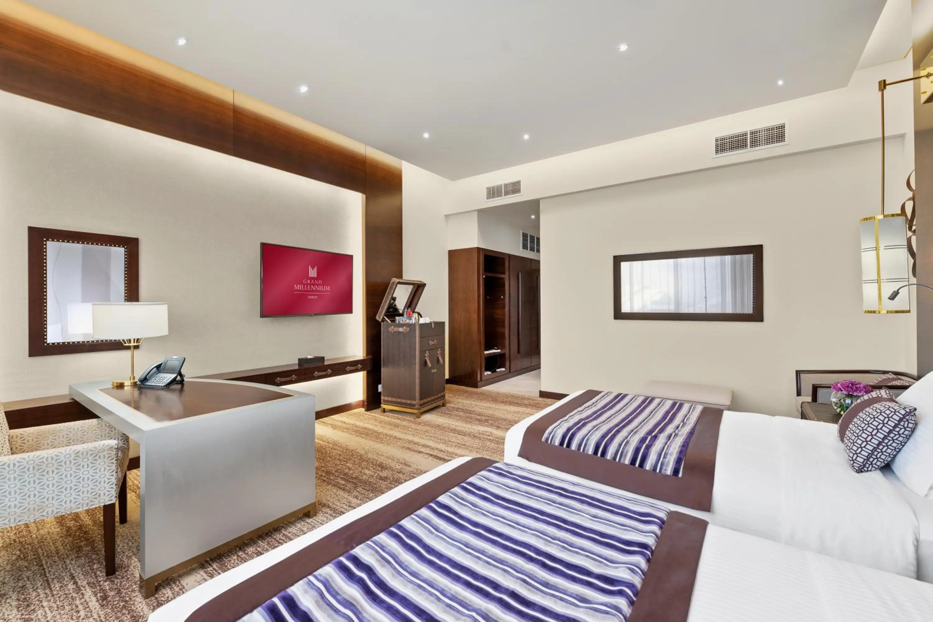 Bedroom, Bed in Grand Millennium Tabuk