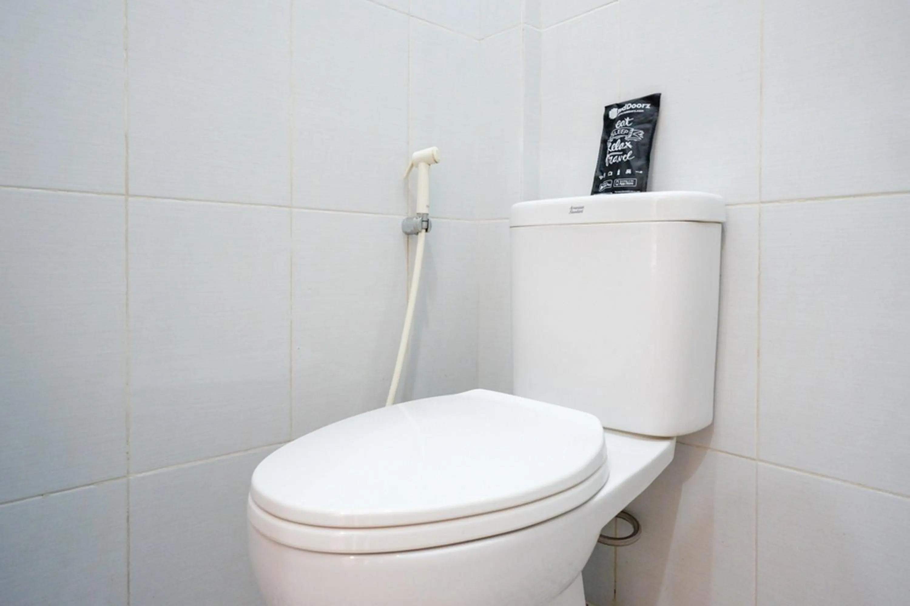 Bathroom in RedDoorz near Padang Golf Adisucipto