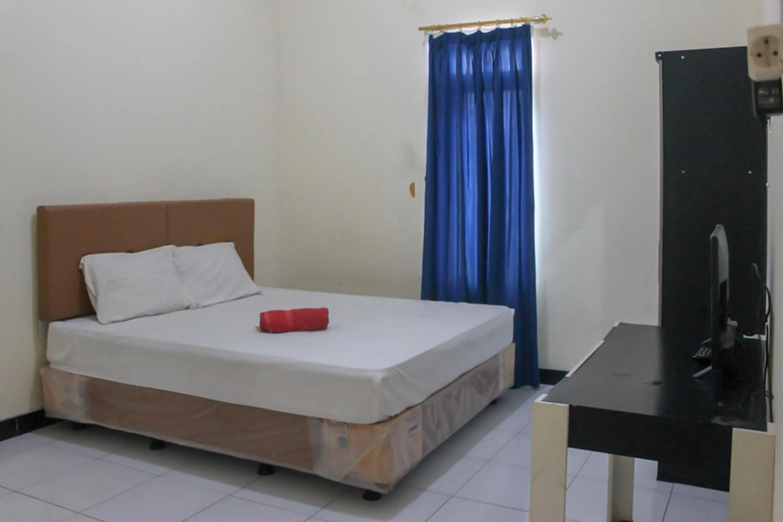 Bed in KoolKost Syariah near Universitas Ahmad Dahlan Kampus 1