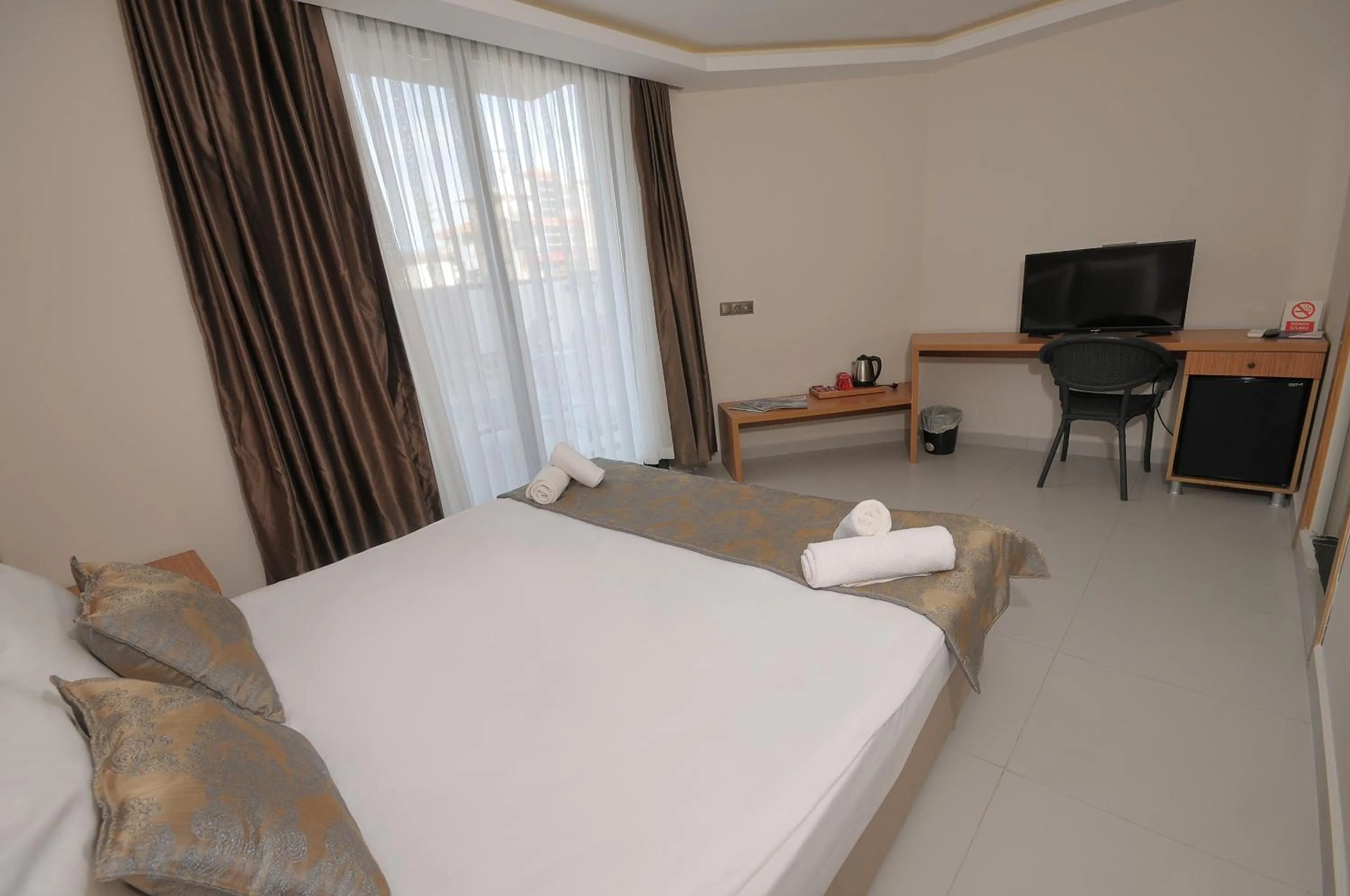 Bed in Saatlı Hotel