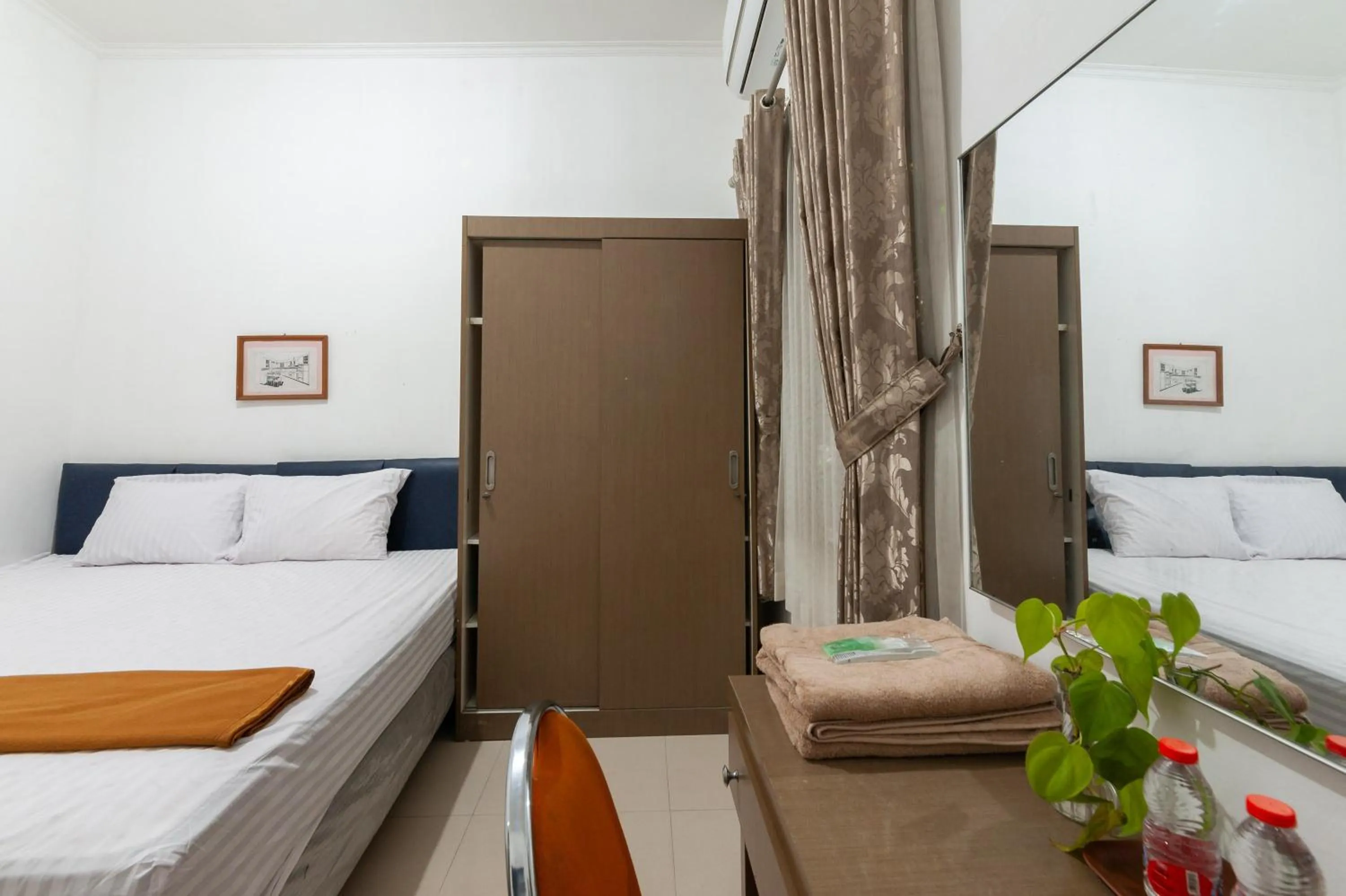 Bed in RedDoorz at Batutulis Bogor by House of M