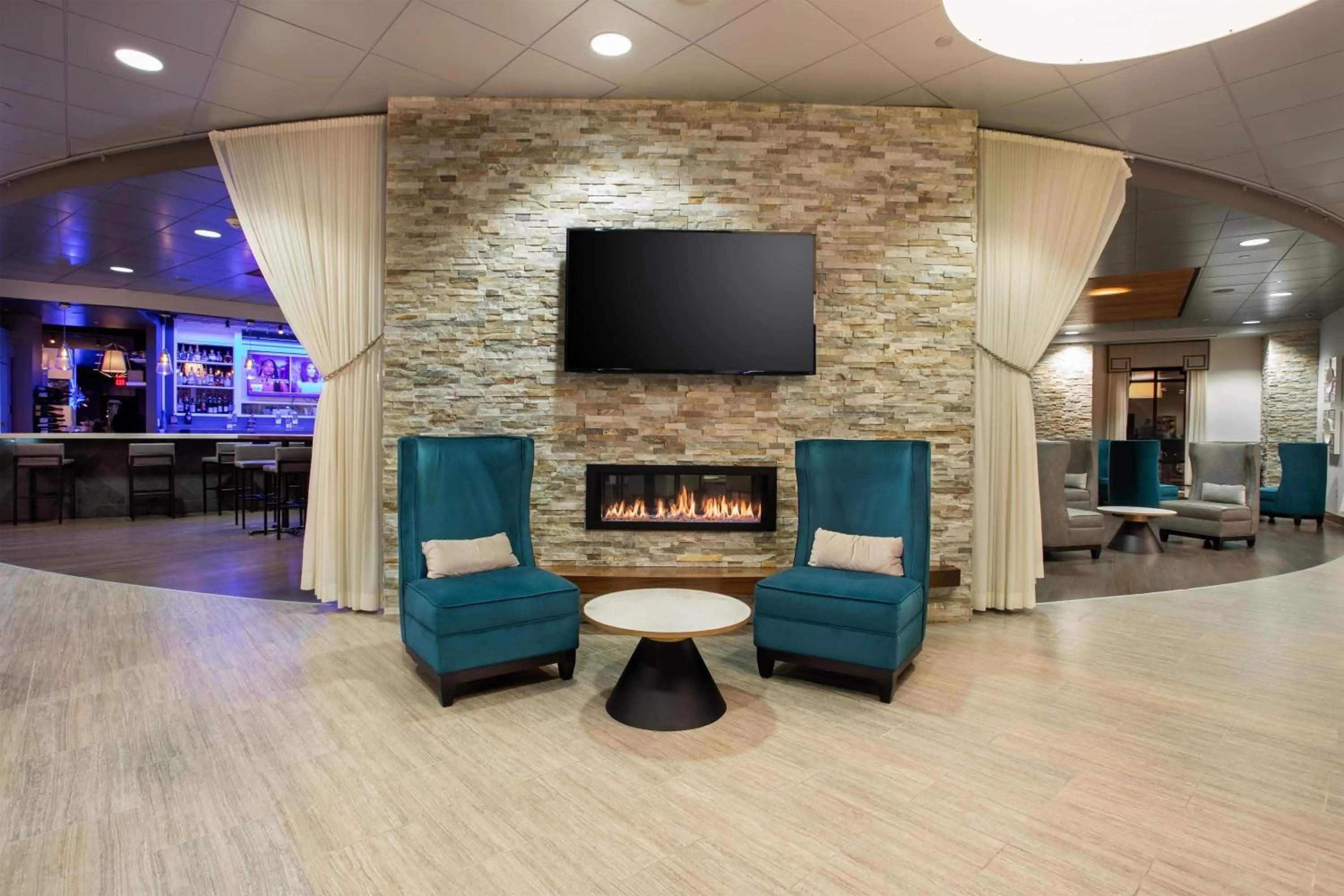 Lobby or reception in The Mosey Buffalo Williamsville Tapestry Collection Hilton