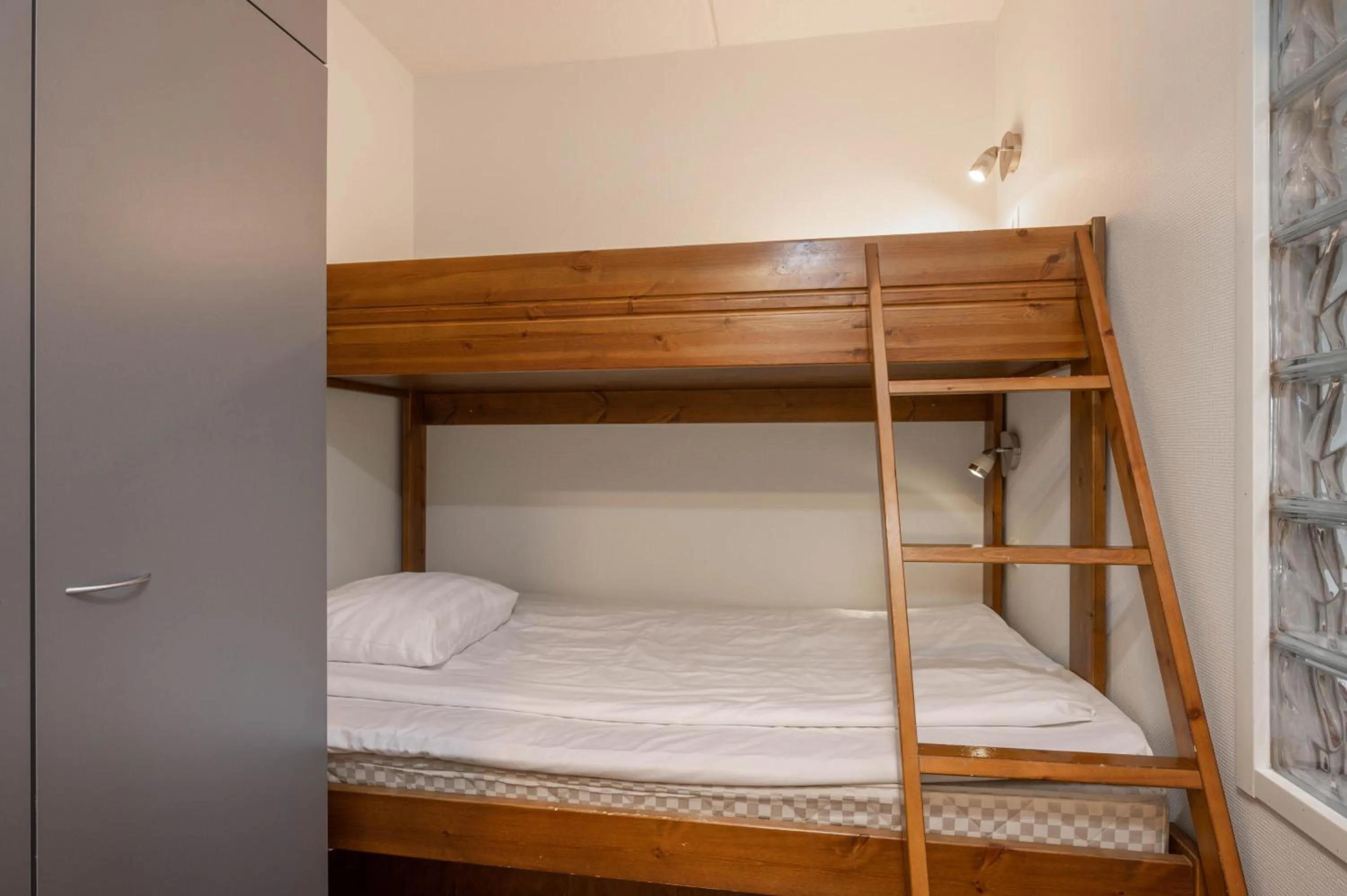 Decorative detail, Bed in Ski-Inn RukaSuites