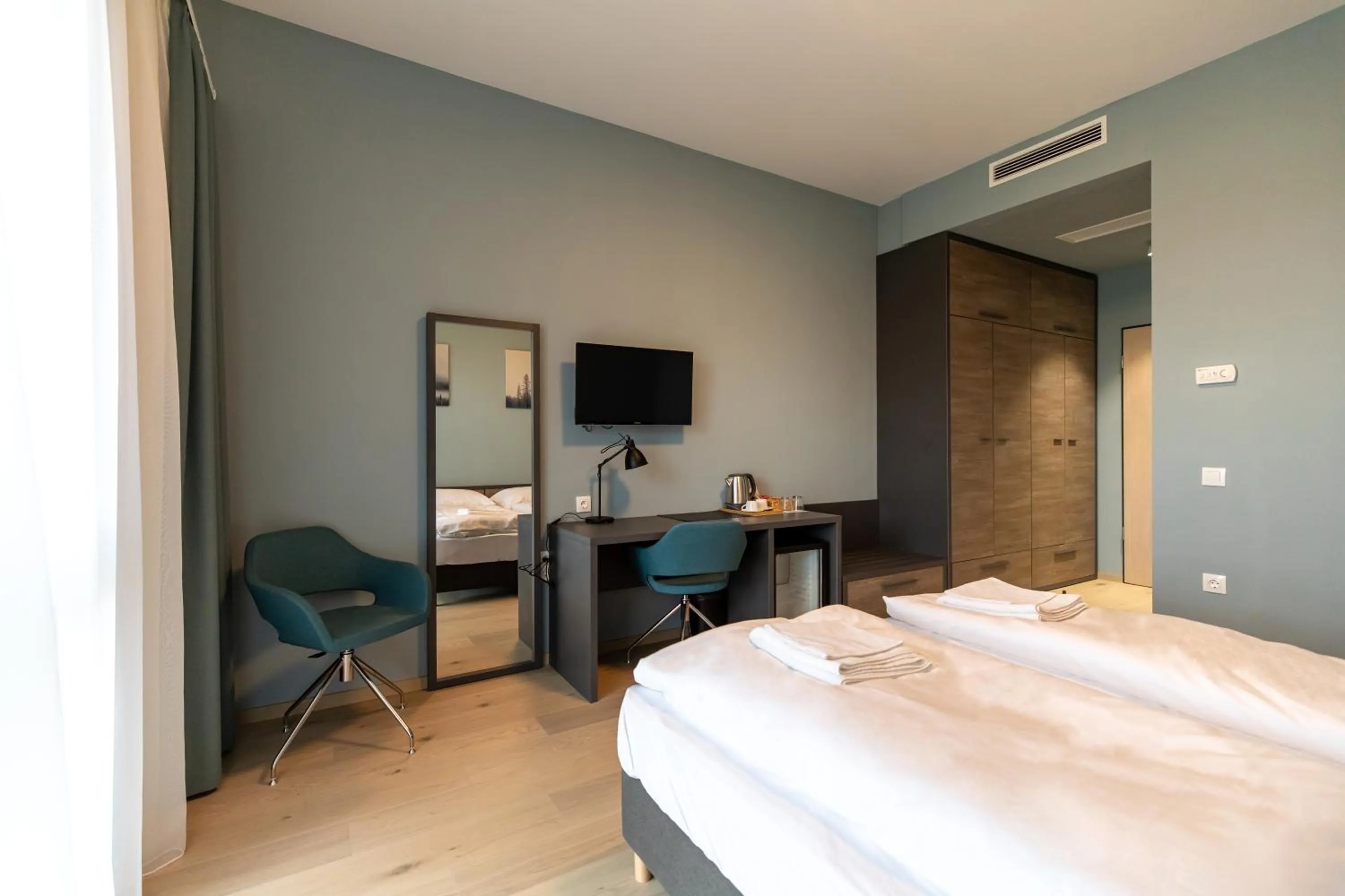 Bed in A22 Hotel Gyál