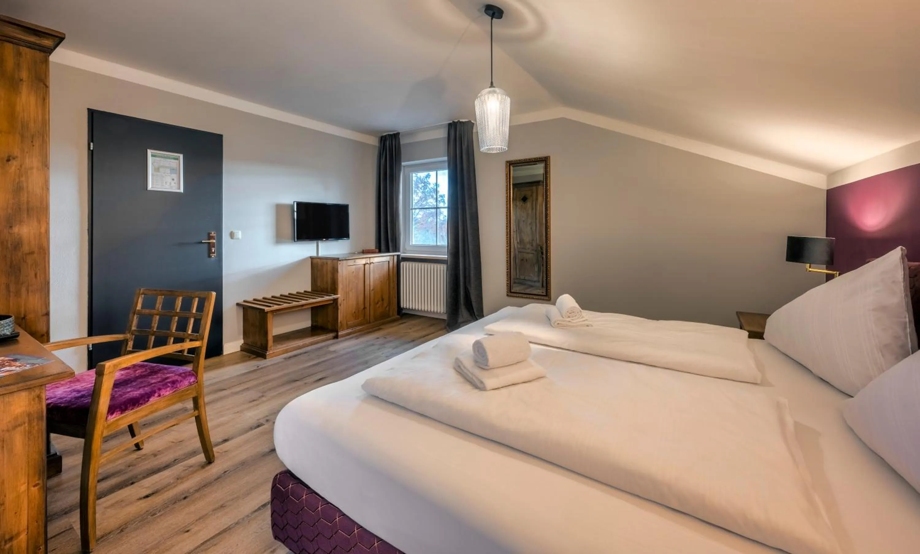 Bed in Hotel Schmiedhubers