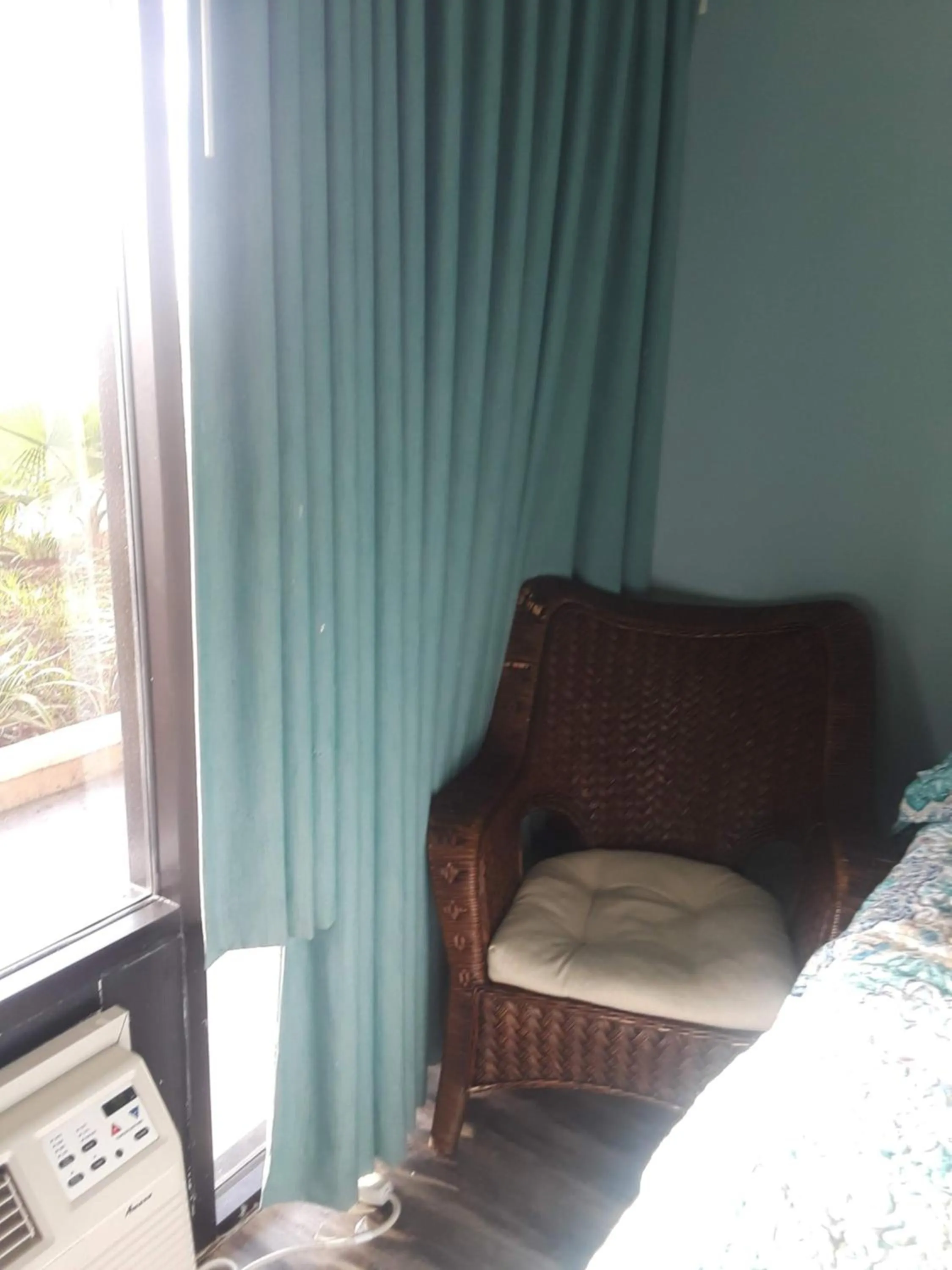 Seating area, Bed in Benjamin's Pier at Laguna Reef Resort