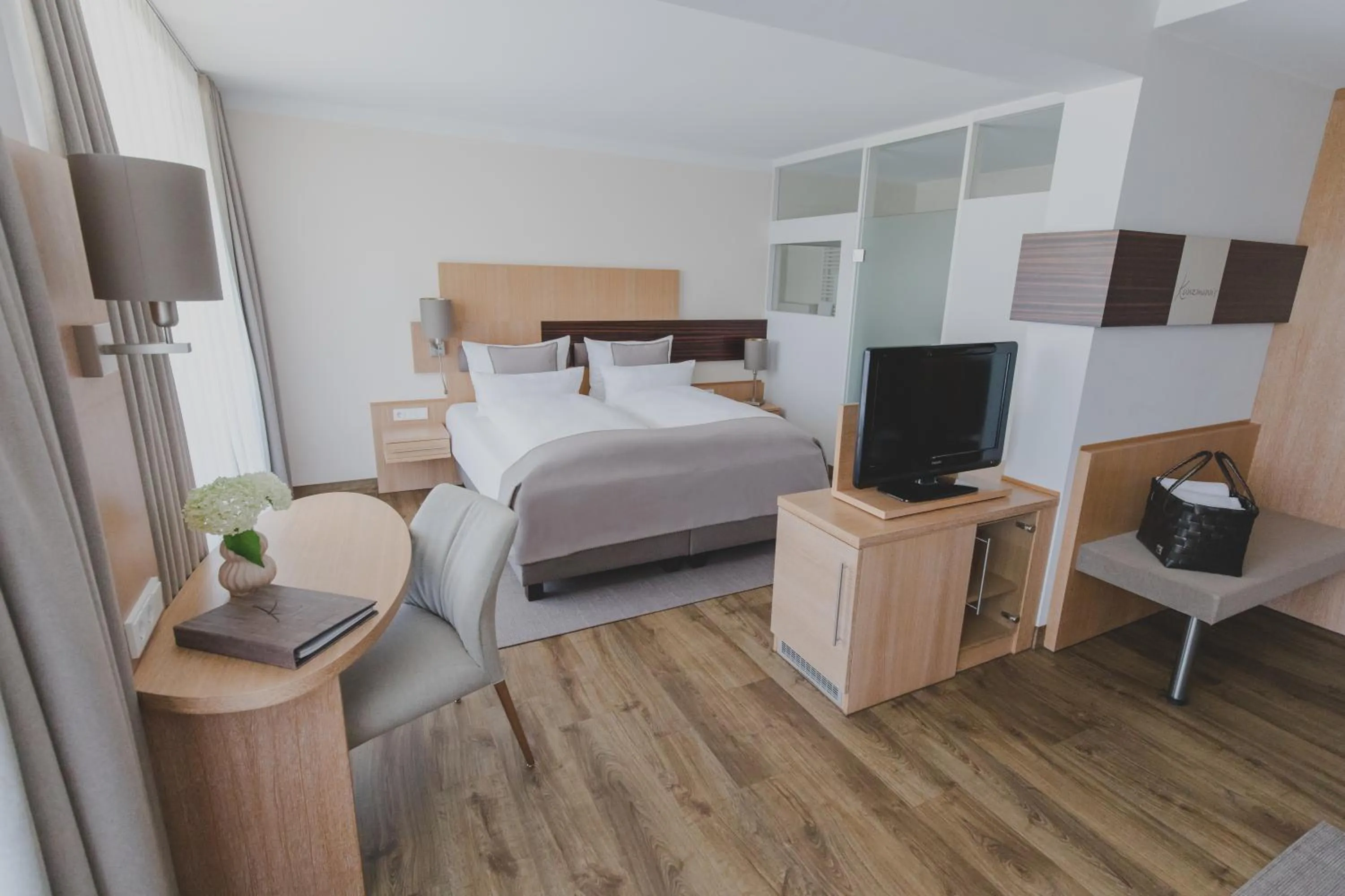 Photo of the whole room, Bed in Kunzmann's Hotel | Spa