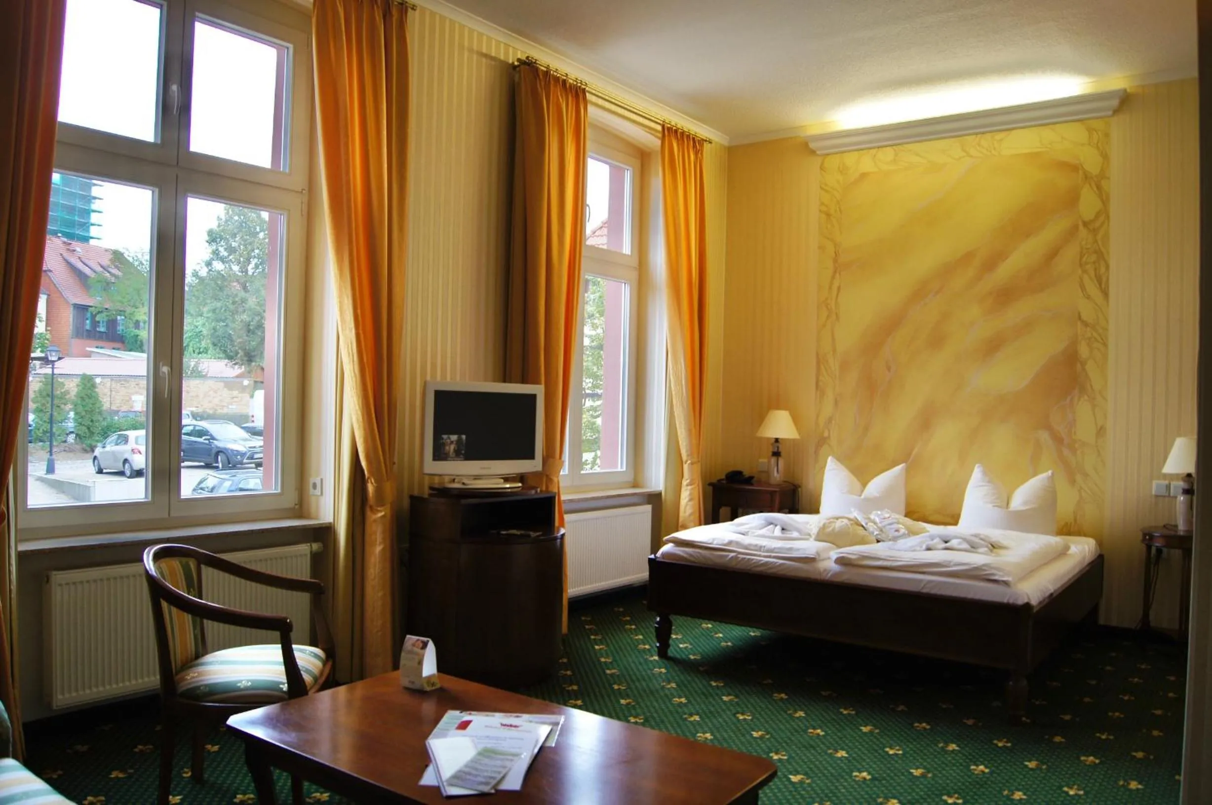 Photo of the whole room, Bed in Waren Müritz Hotel Harmonie
